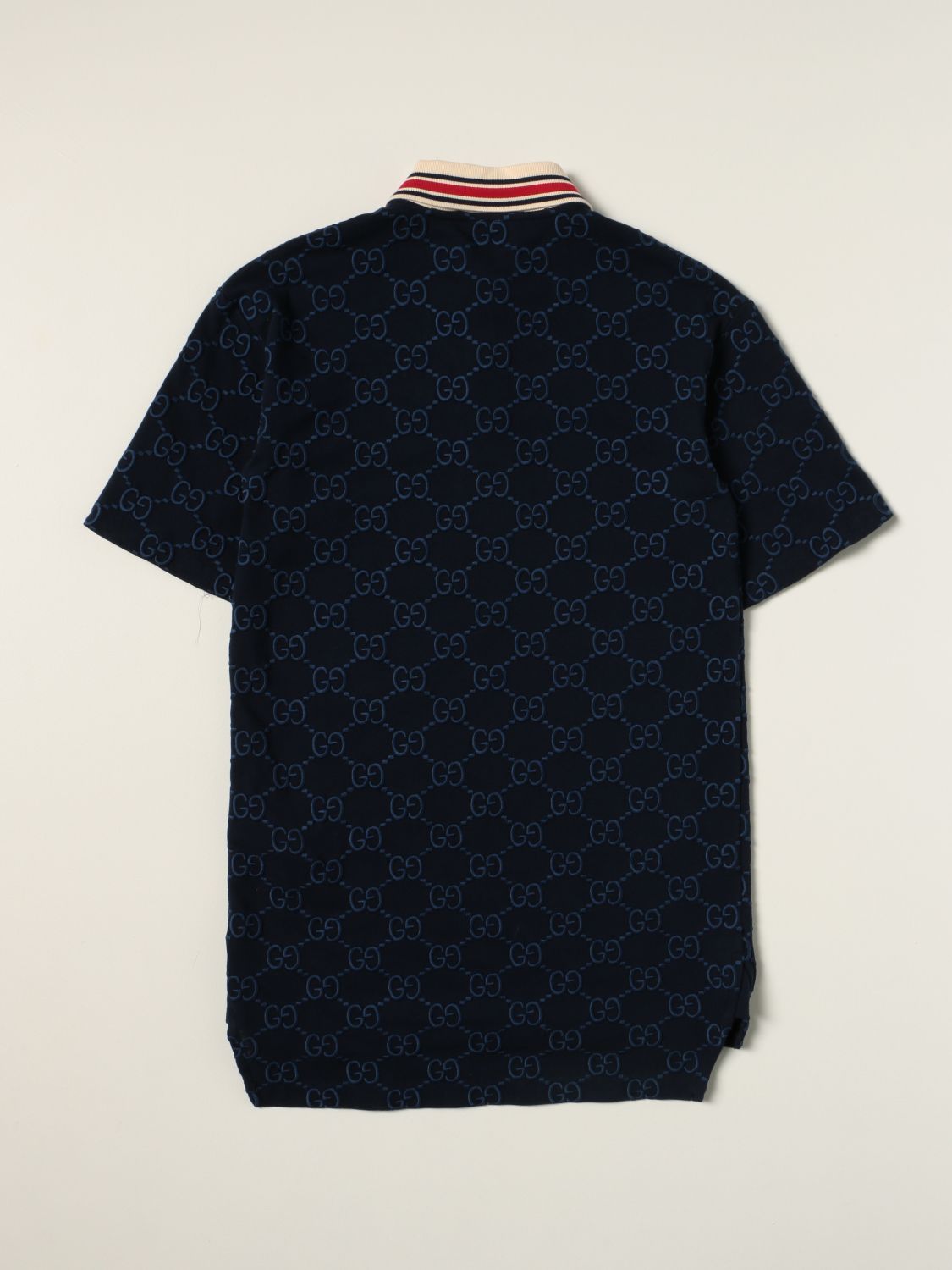 GUCCI: cotton polo shirt with all-over GG Supreme logo - Blue