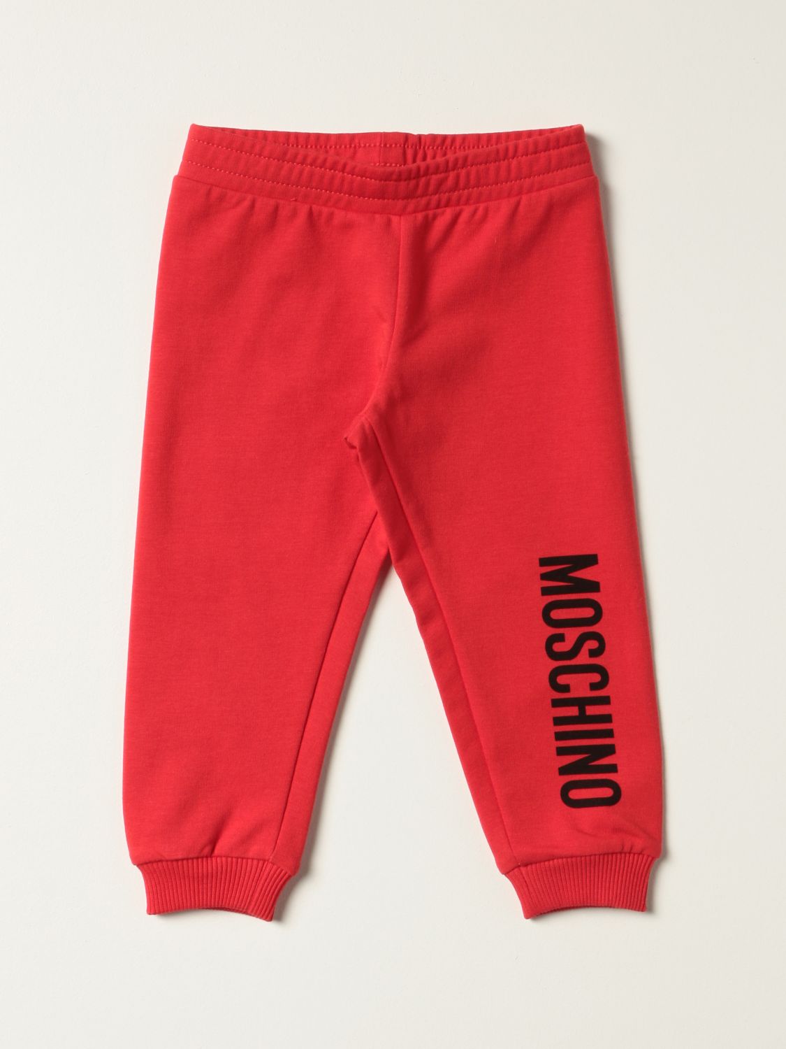 MOSCHINO BABY: jogging pants with logo - Red | Moschino Baby pants ...