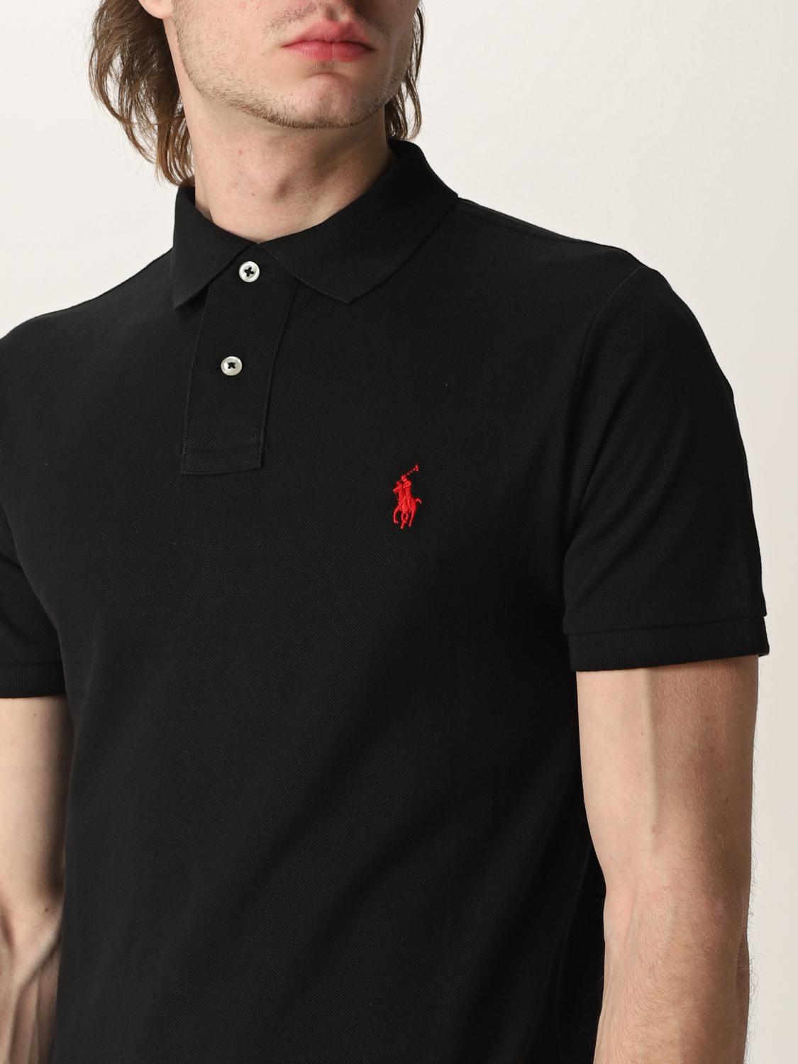 black polo shirt with red logo