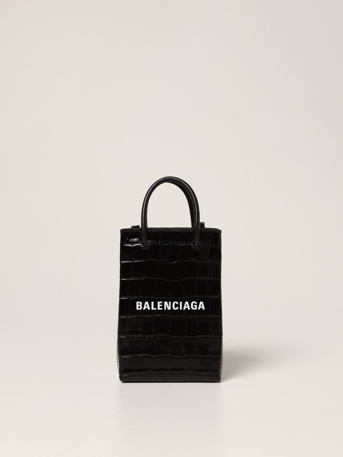 Shop tote bags and phone covers from Balenciaga x Crocs collaboration