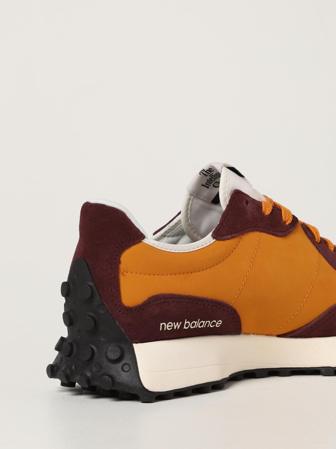 new balance orange trainers