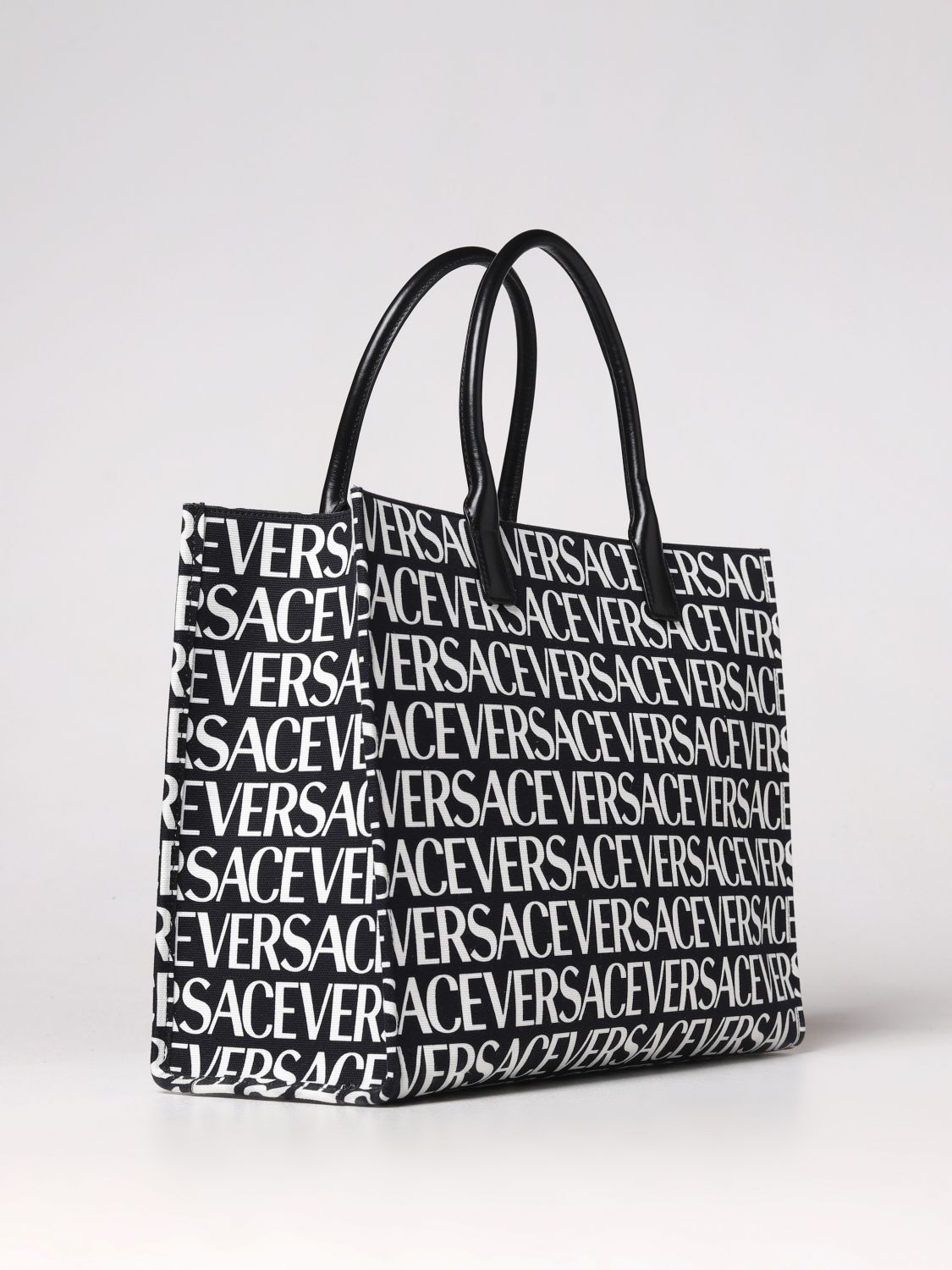 VERSACE: bag in canvas with all over logo - Pink  Versace tote bags  10047411A06544 online at