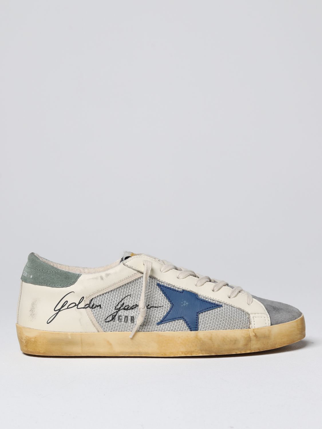 GOLDEN Super-Star sneakers in leather and used fabric - | Golden Goose sneakers GMF00103F00410682160 on GIGLIO.COM