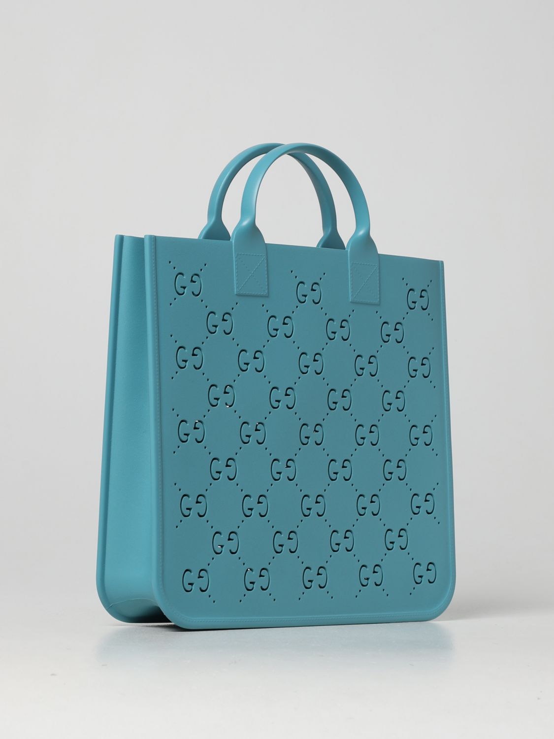GUCCI: Rubber bag with perforated GG monogram - Blue | Gucci bag  679365JFO00 online on 