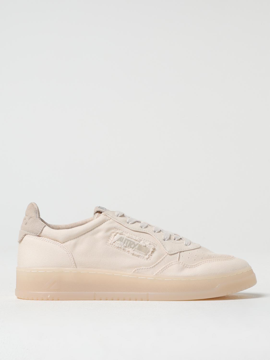 Autry Ivory Sneakers With Design And Cushioned Sole In White