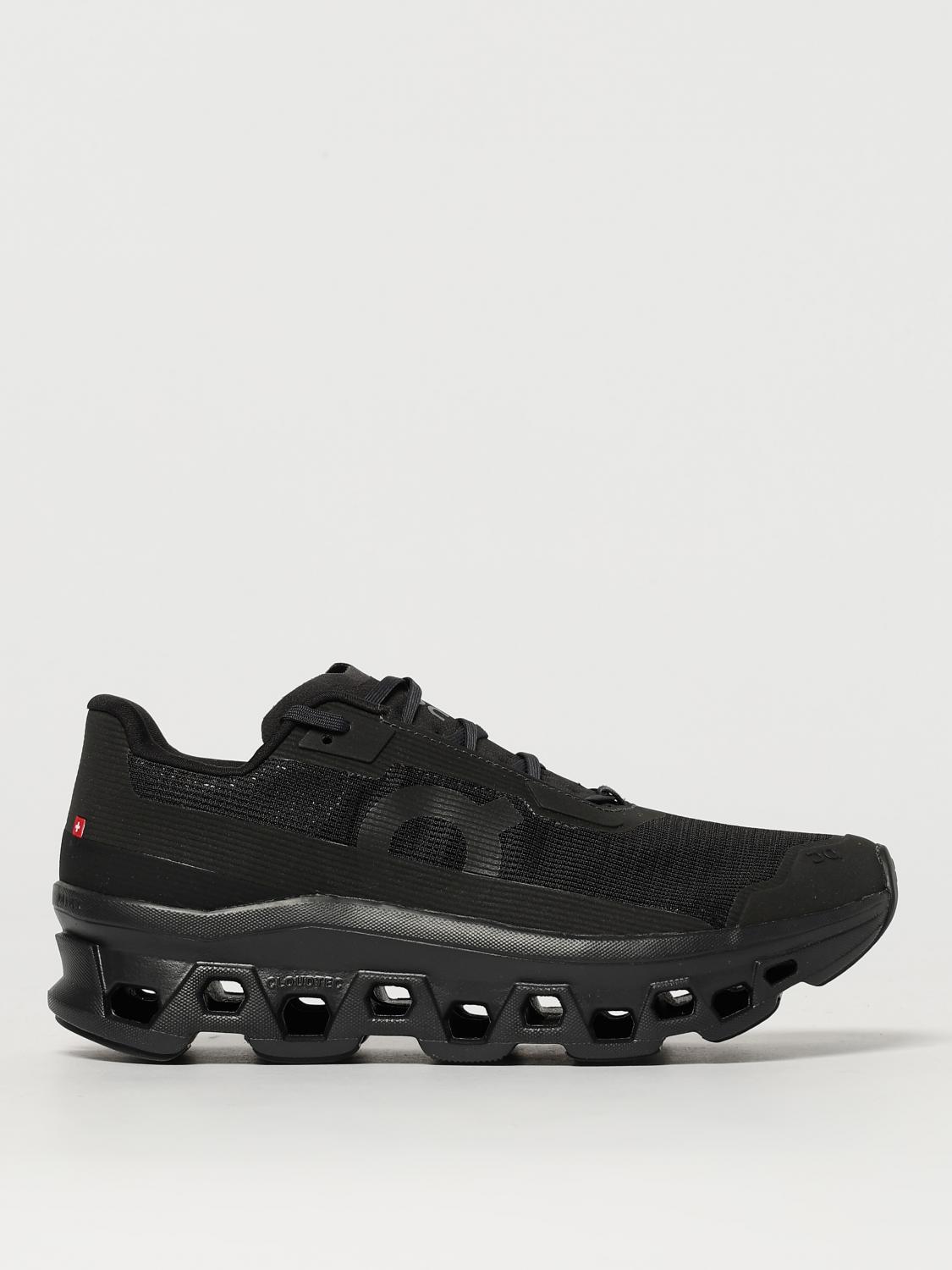 On Running Black Sneakers With Breathable Mesh Upper And Distinctive Sole In Black