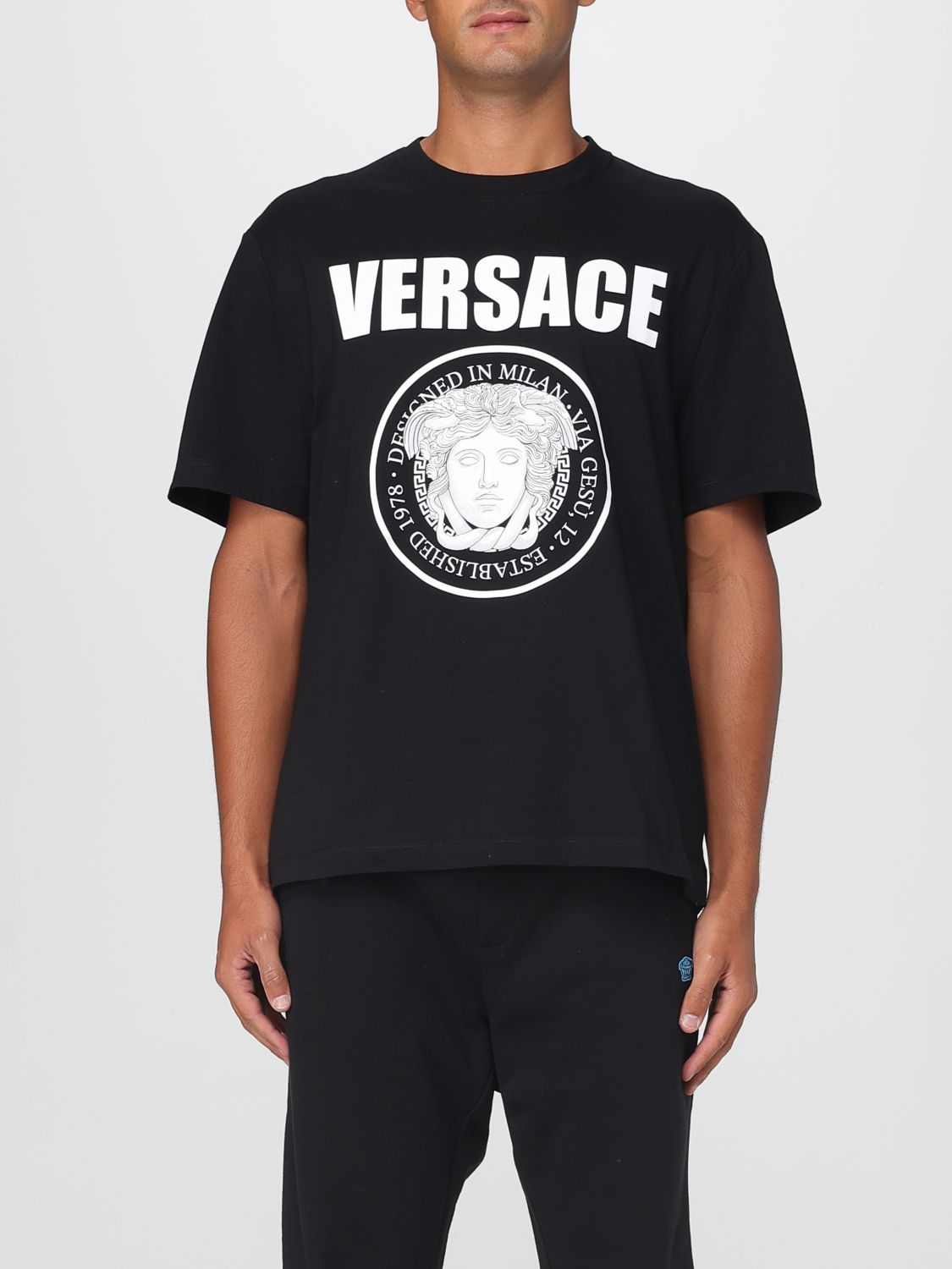 Versace Black Crewneck T-shirt With Maxi Logo Print On The Front In Black
