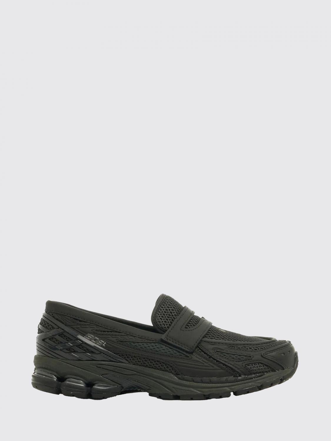 New Balance Sneakers Men color Black