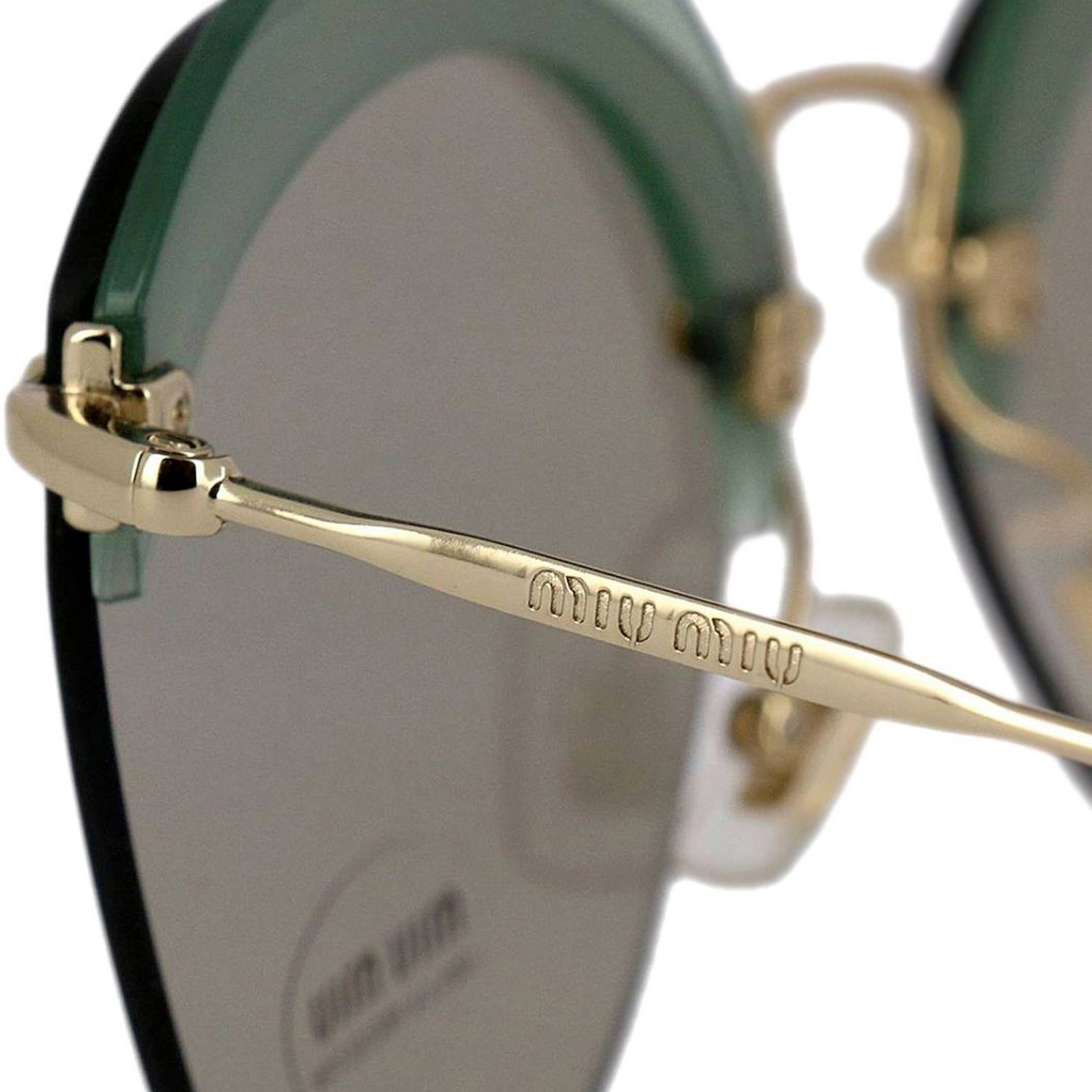 Miu Miu Outlet: Sunglasses women - Green | Glasses Miu Miu SMU53S GIGLIO.COM