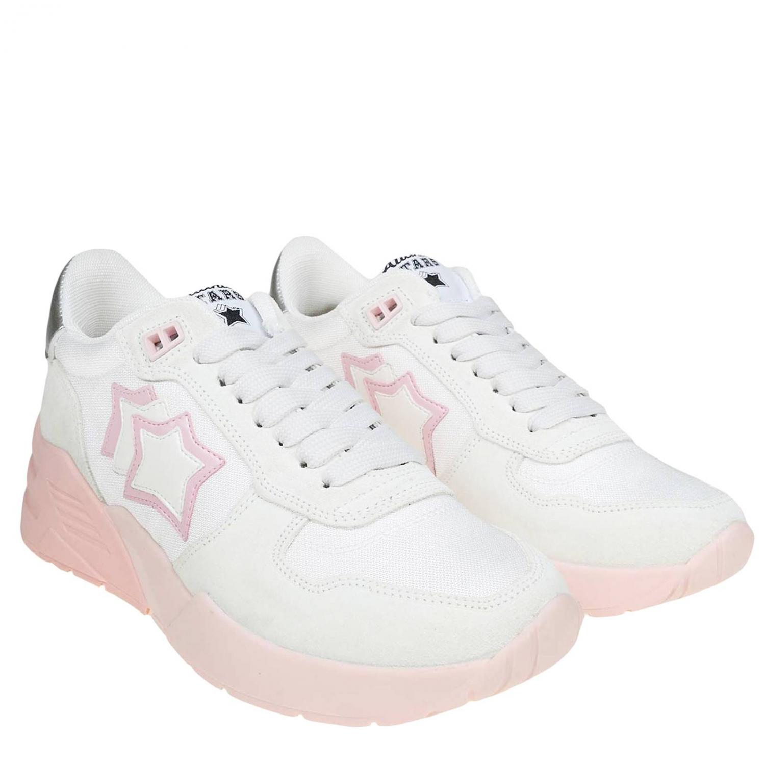 white sneakers with stars on them