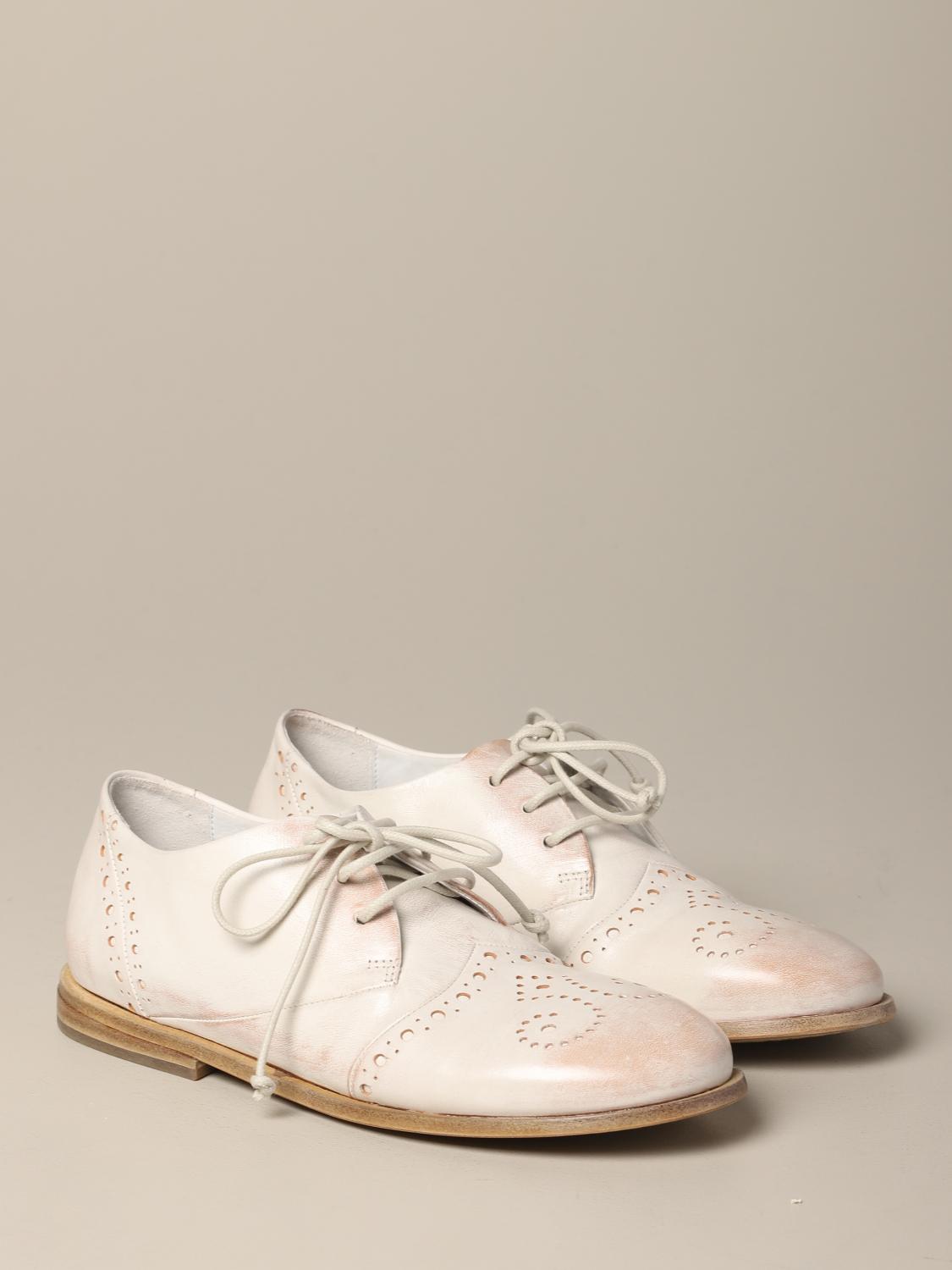 pink and white oxford shoes