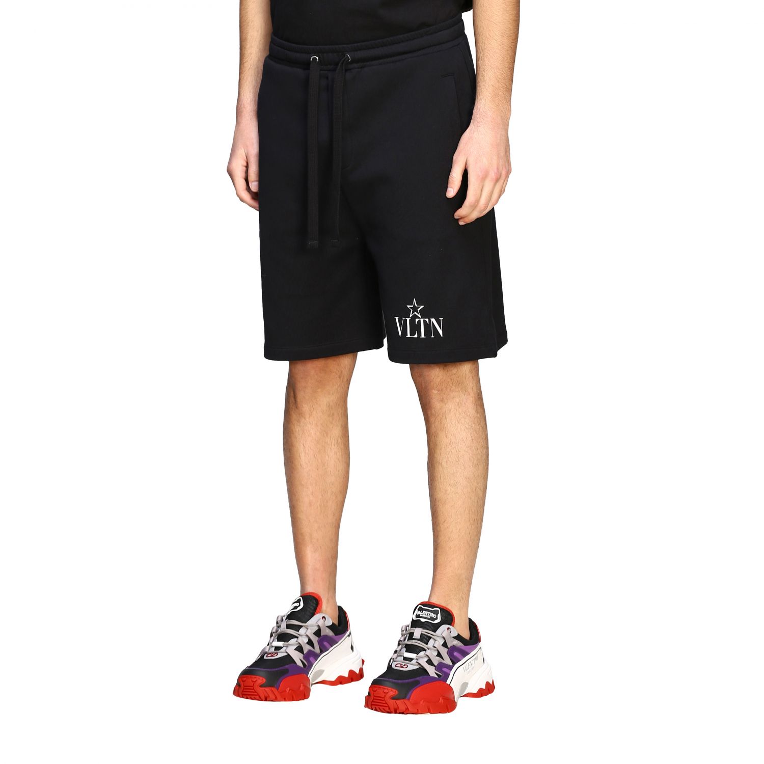 VALENTINO: jogging-style bermuda shorts with VLTN monogram - Black ...