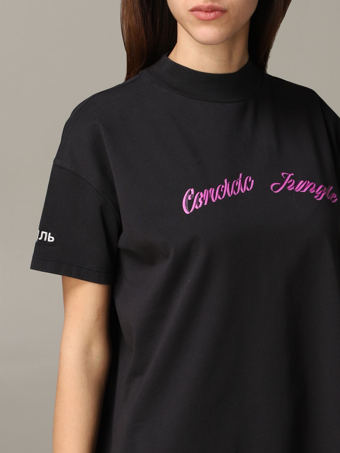 black champion shirt with pink writing