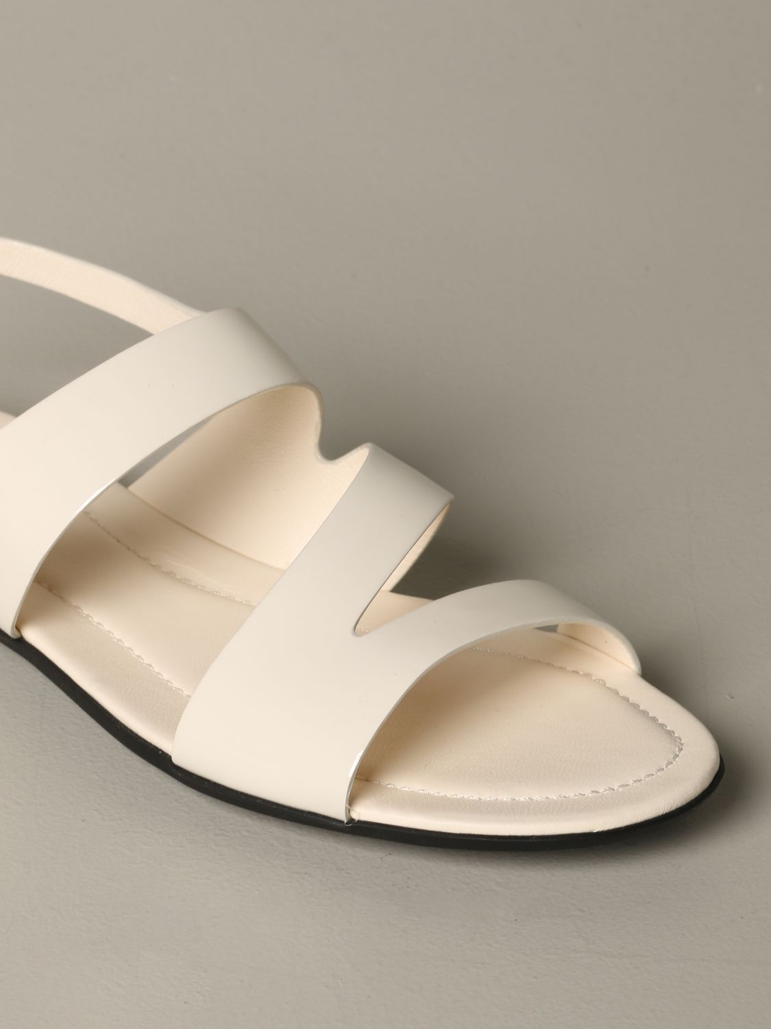 Tod's Outlet: Sandalias planas mujer - Leche | Sandalias Planas Tod's  XXW0OV0T680 OW0 GIGLIO.COM