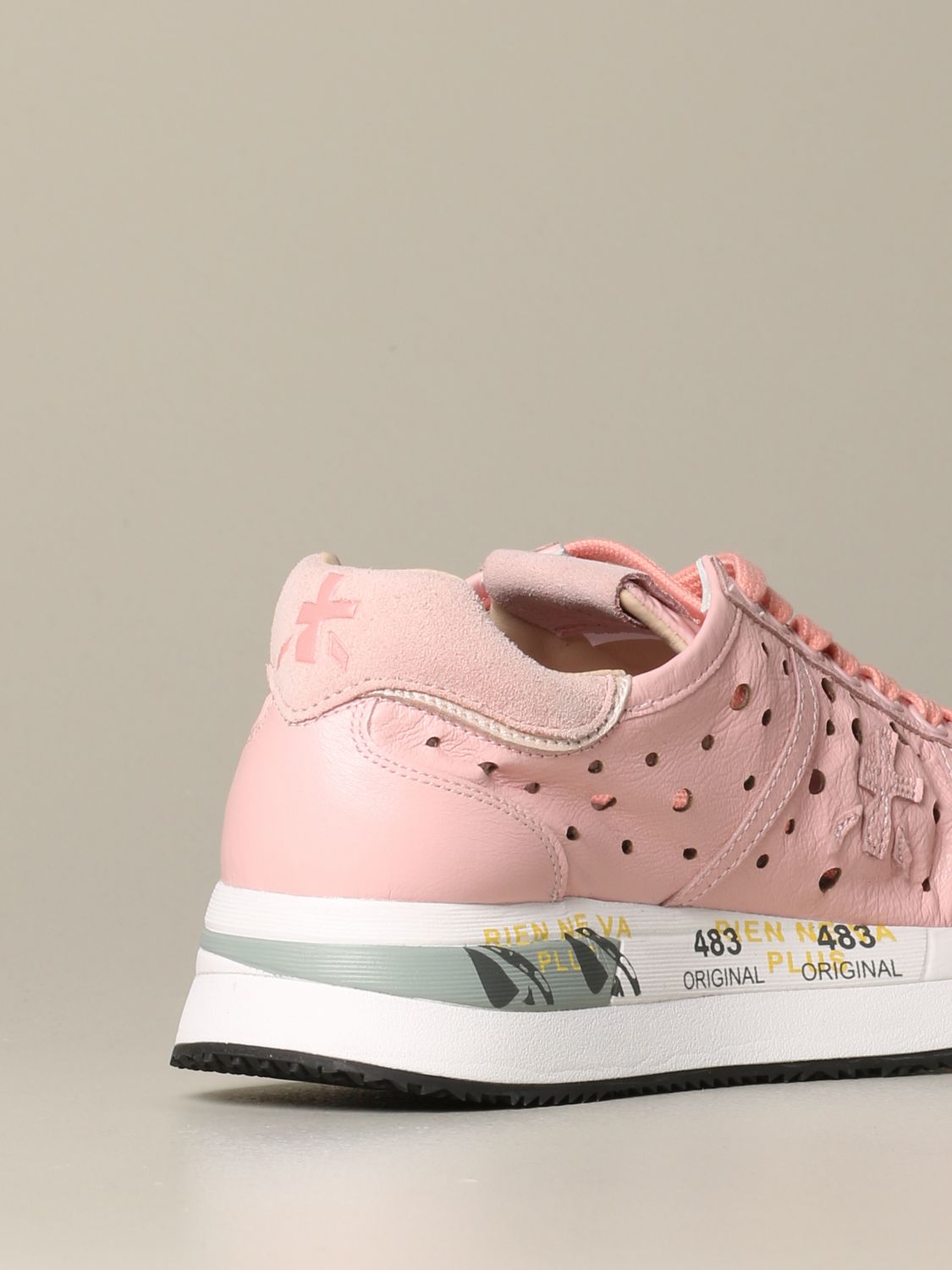 pink perforated sneakers