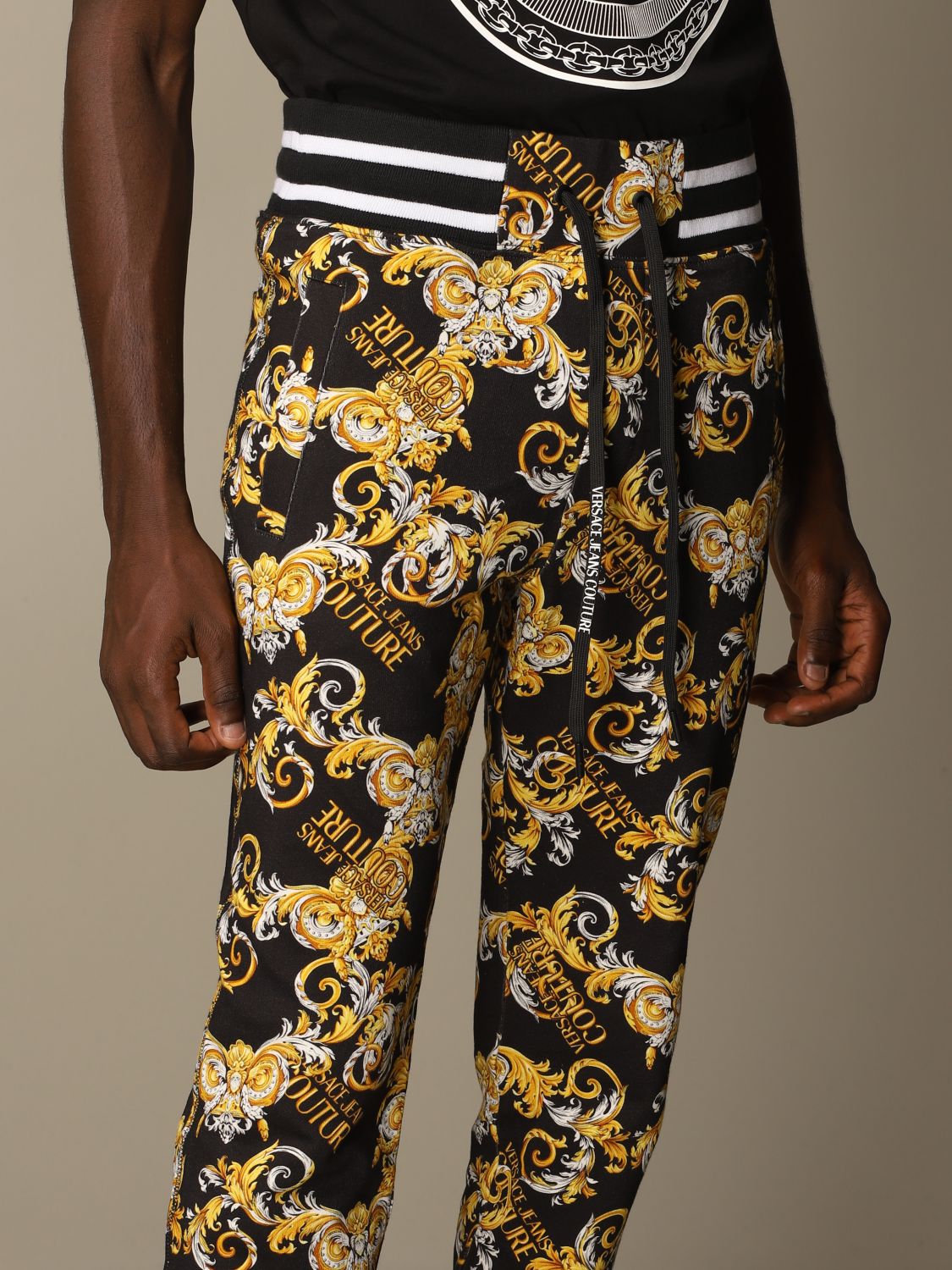 VERSACE JEANS COUTURE: jogging trousers with baroque pattern | Pants
