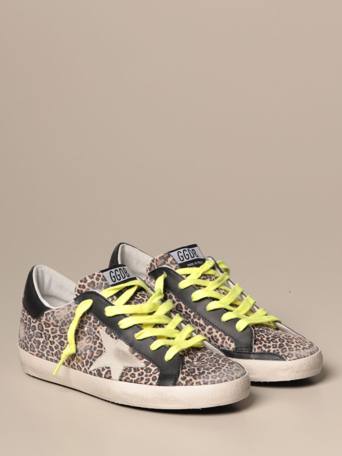 golden goose beige sneakers