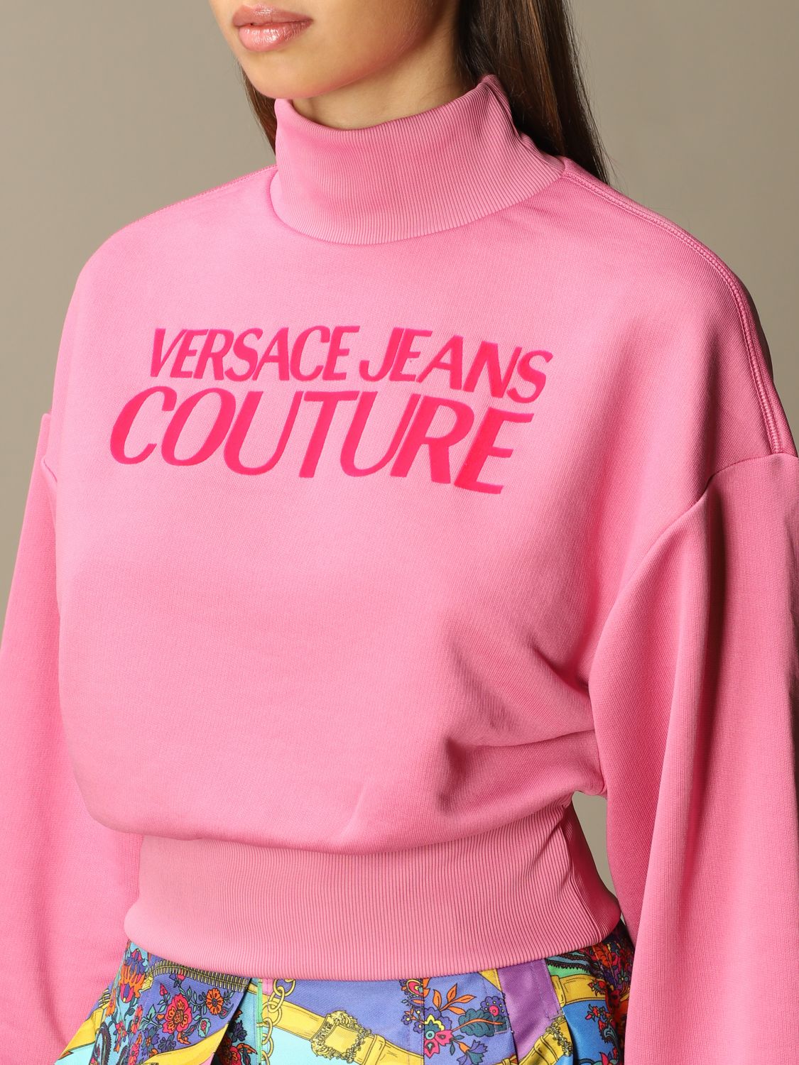 pink jeans versace