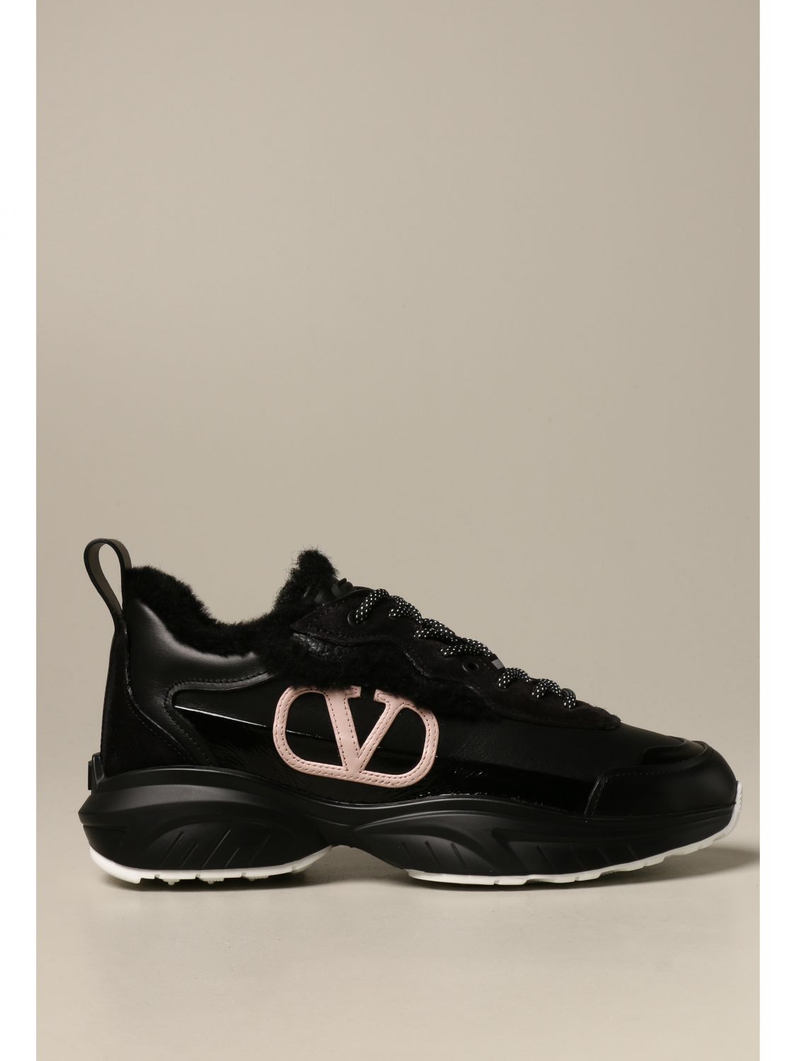 VALENTINO GARAVANI: Shegoes sneakers in leather and fur - Black | Valentino Garavani UW2S0AB1 XZX online at GIGLIO.COM