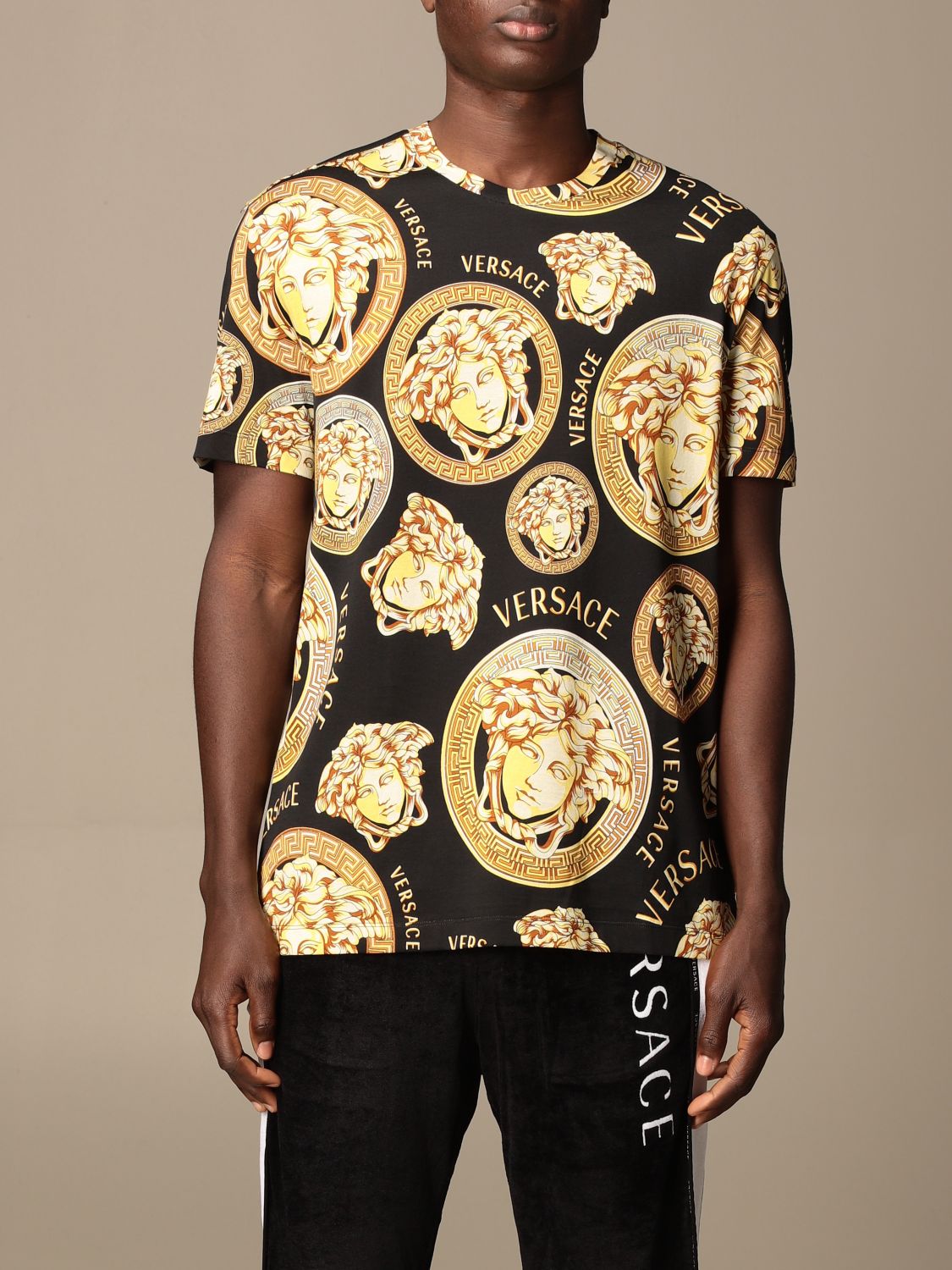 VERSACE: cotton T-shirt with medusa heads - Black | Versace t