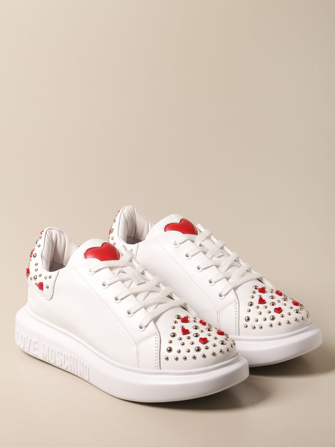 LOVE MOSCHINO: sneakers in leather with hearts and studs - White | Love ...