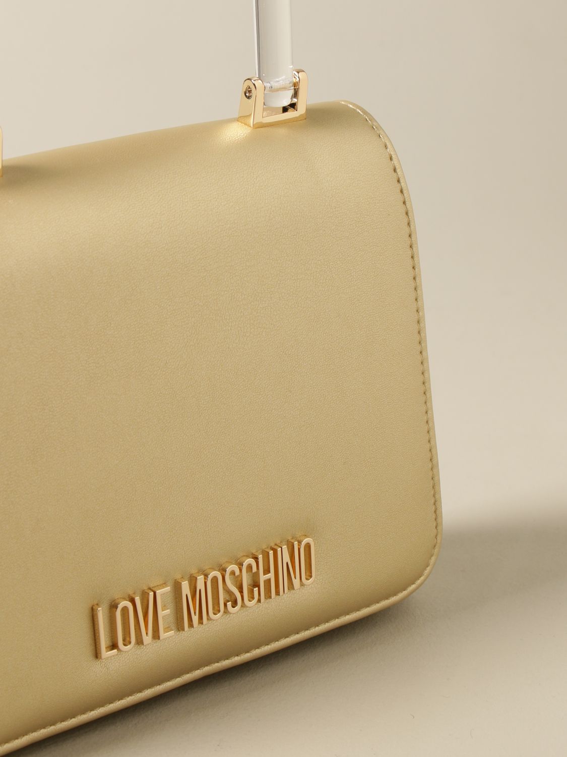 gold love moschino bag