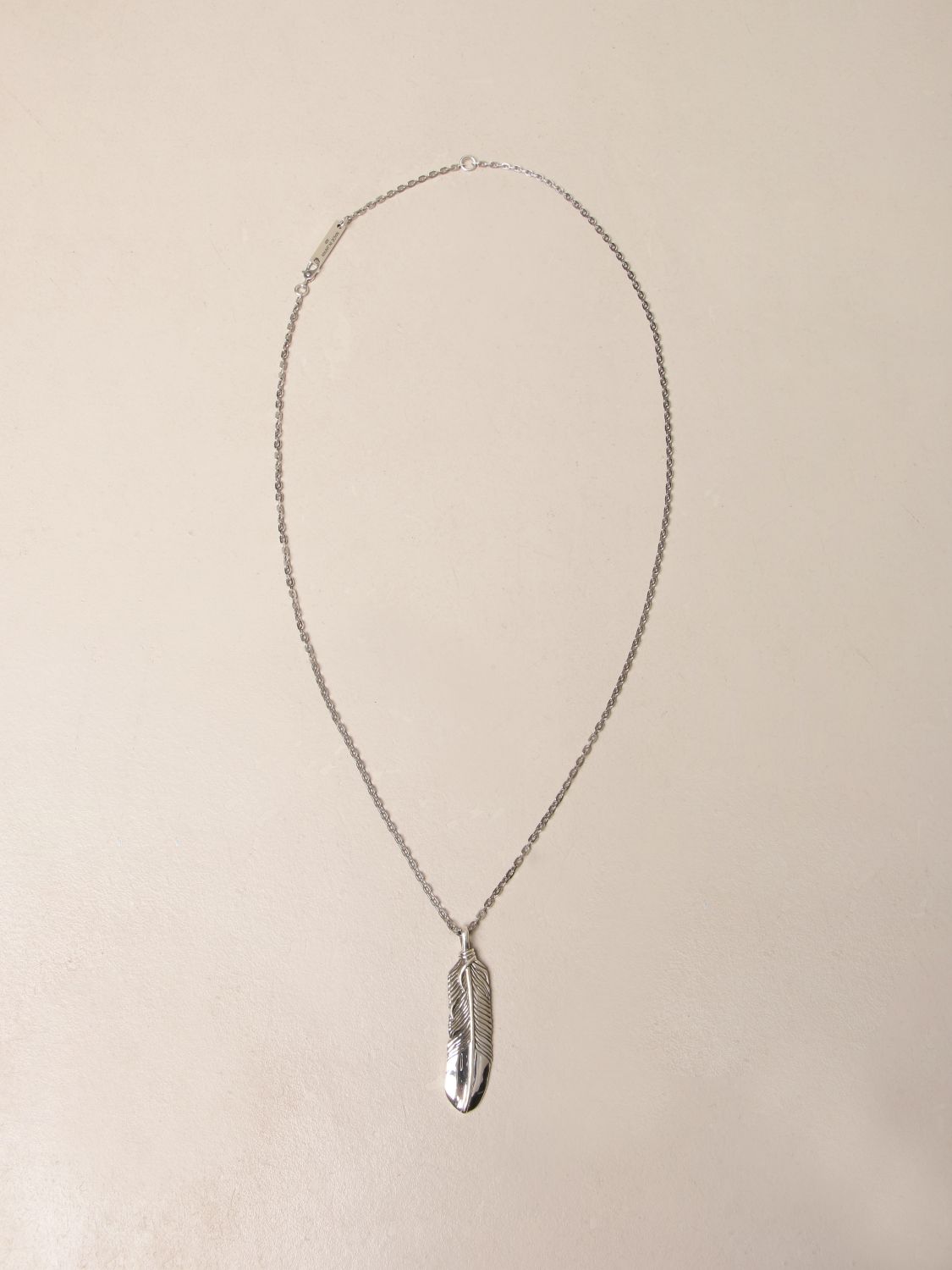 Ambush necklace with feather pendant