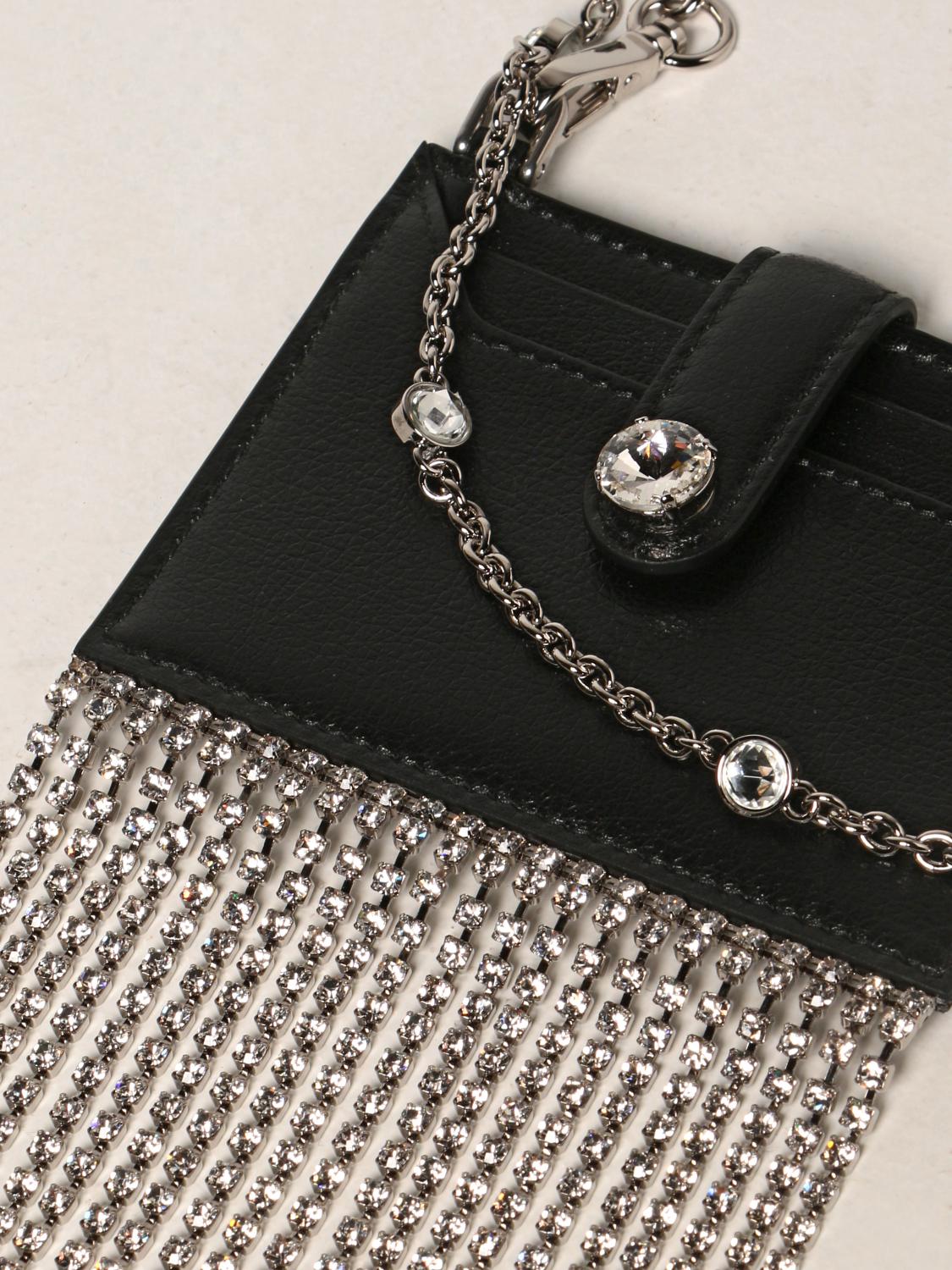 A rhinestone-covered cardholder with chain by Prada, 202…