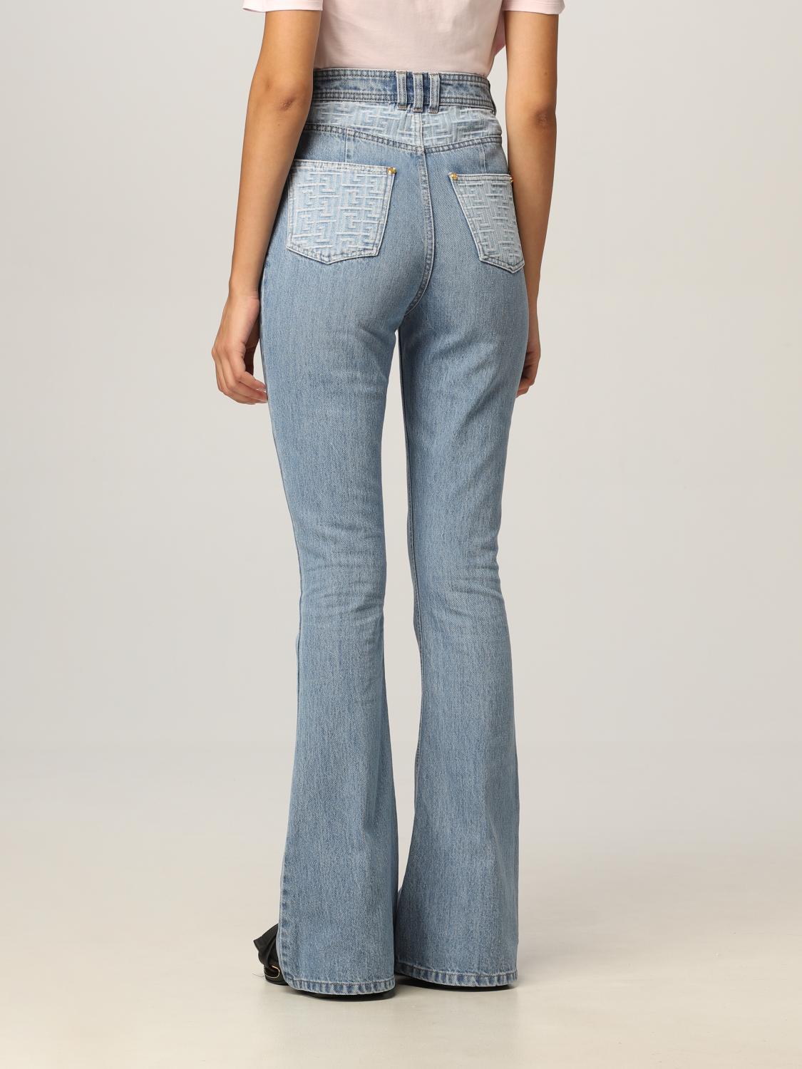 BALMAIN: jeans in denim with monogram 