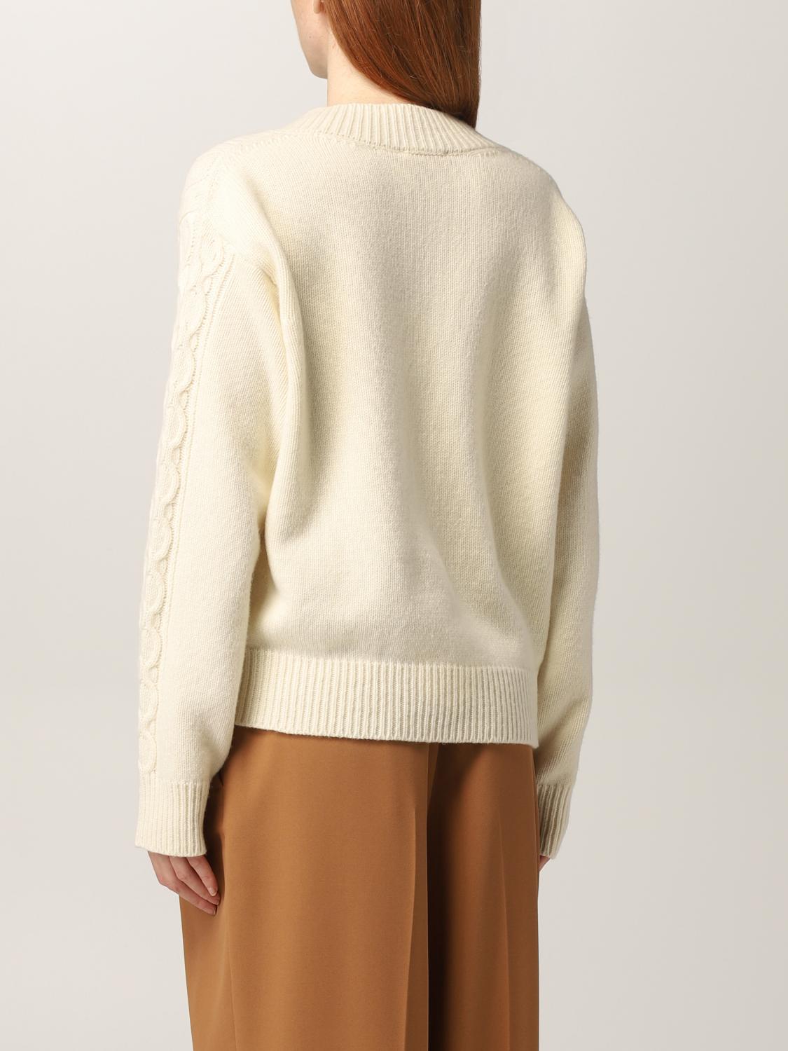 white boxy sweater