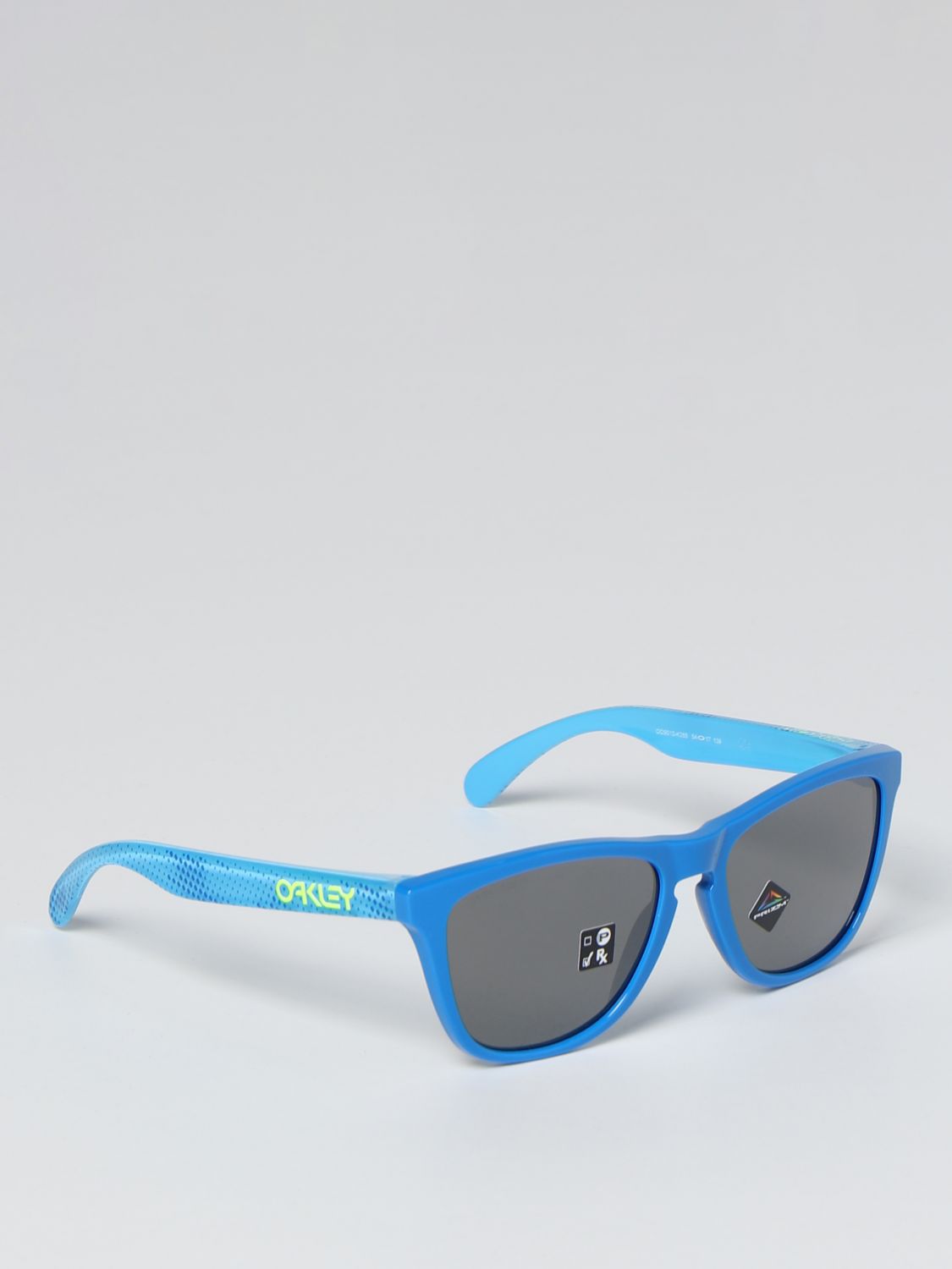 estanque fuegos artificiales Surichinmoi OAKLEY: Gafas para hombre, Azul Claro | Gafas Oakley FROGSKINS 9013 en  línea en GIGLIO.COM