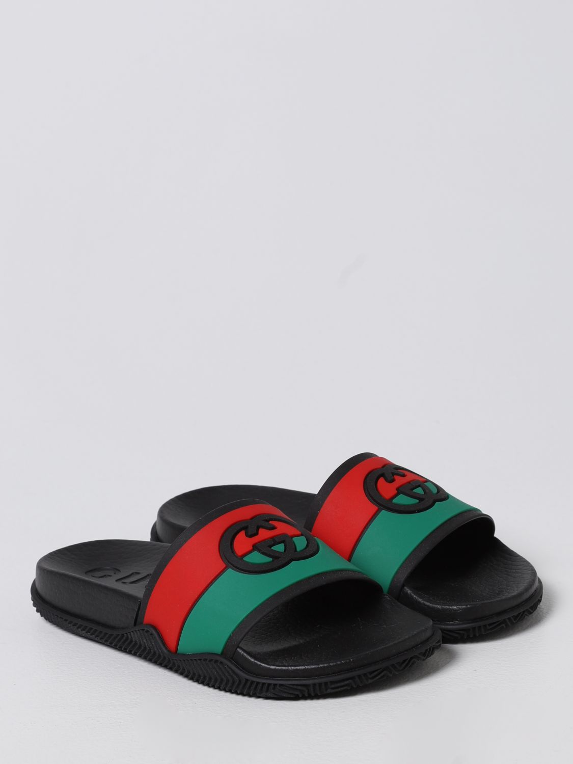 GUCCI: rubber slides - Black  Gucci shoes 681330JFA00 online at