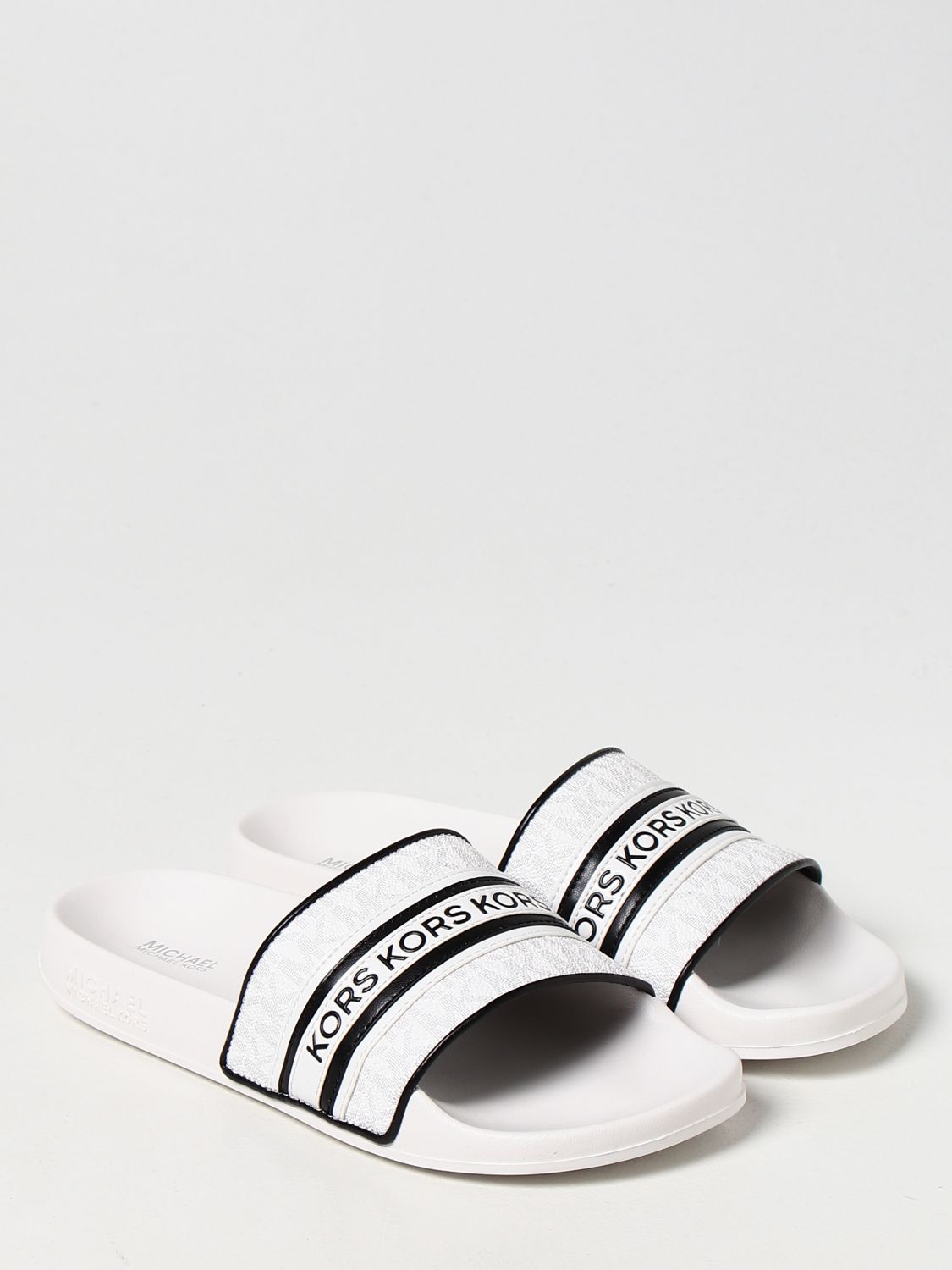 Flat sandals Michael Kors: Michael Michael Kors slide sandals in monogram canvas white 2