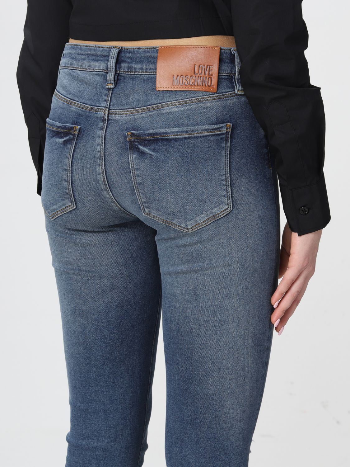 Love Outlet: jeans in washed denim with tears - Blue | Love Moschino jeans on GIGLIO.COM