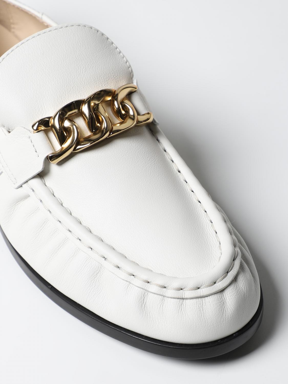 white loafers gold buckle