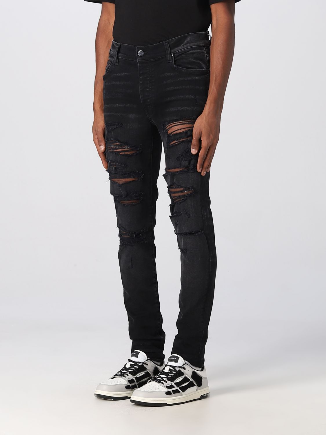 AMIRI: jeans for man - Black | Amiri jeans PXMD005 online on GIGLIO.COM