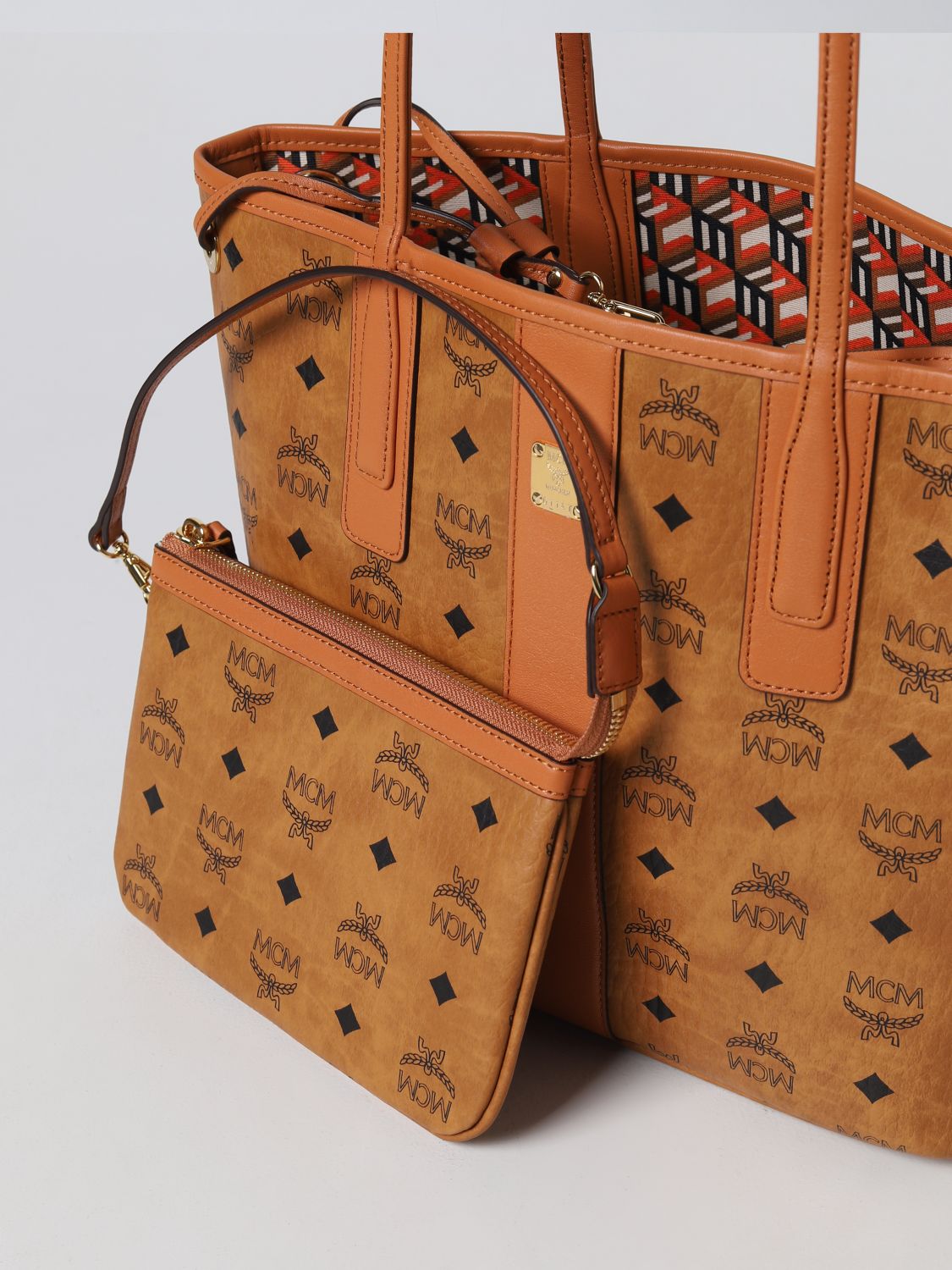 MCM: tote bags for woman - Brown  Mcm tote bags MWPAAVI01 online at