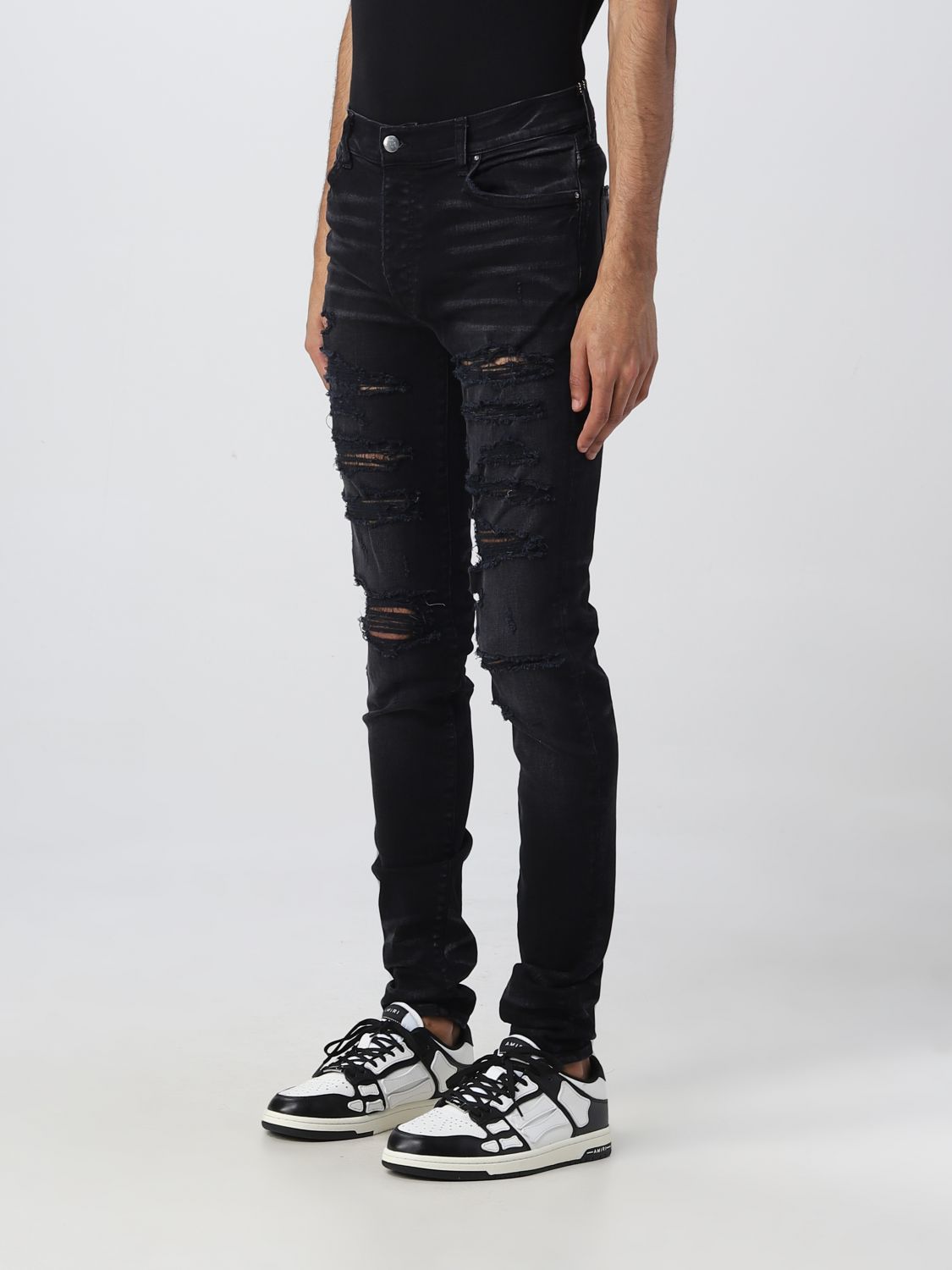 AMIRI: jeans for man - Black | Amiri jeans PXMD005 online on GIGLIO.COM