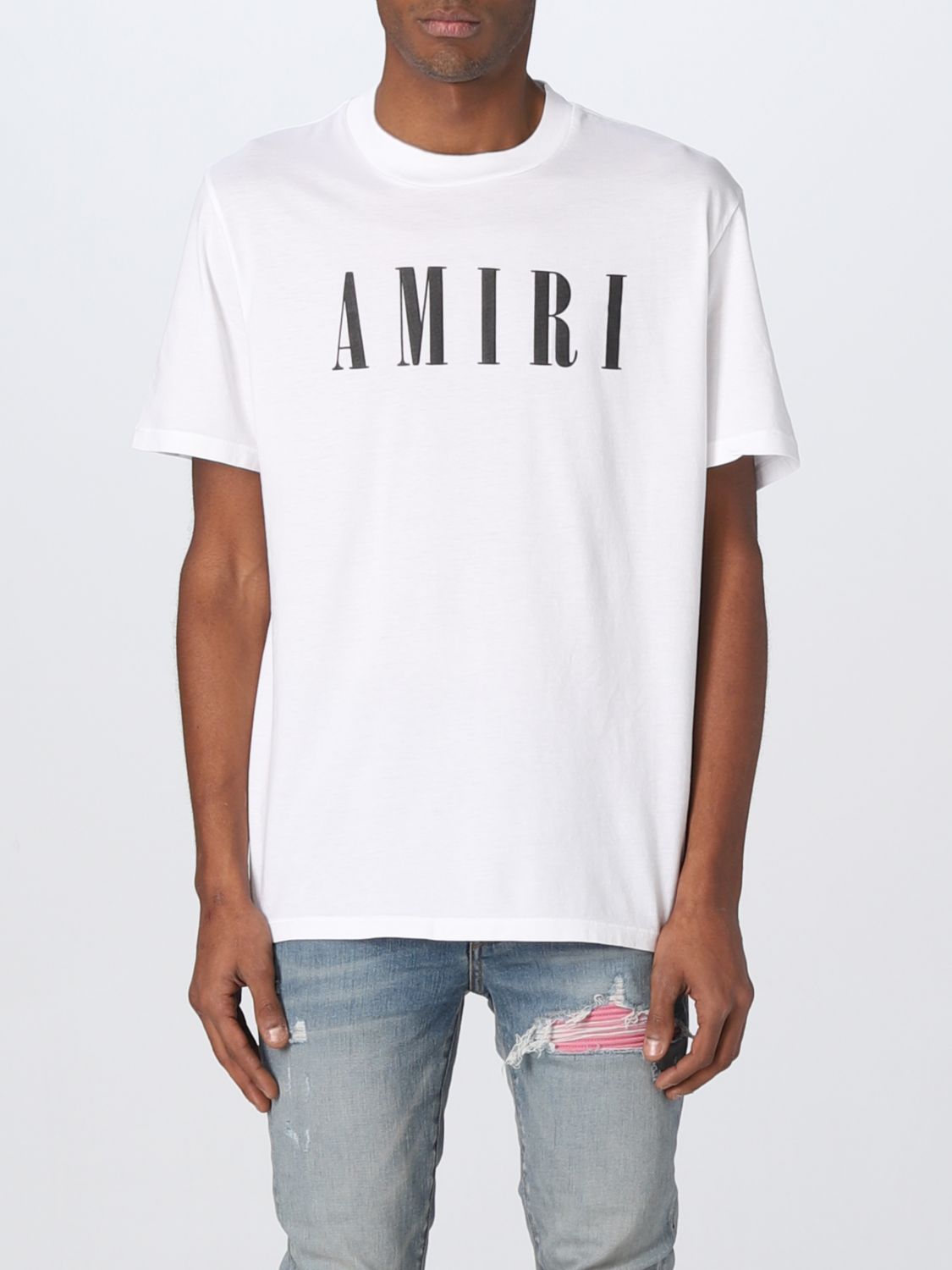 T-shirt Amiri: T-shirt di cotone Amiri con logo bianco 1