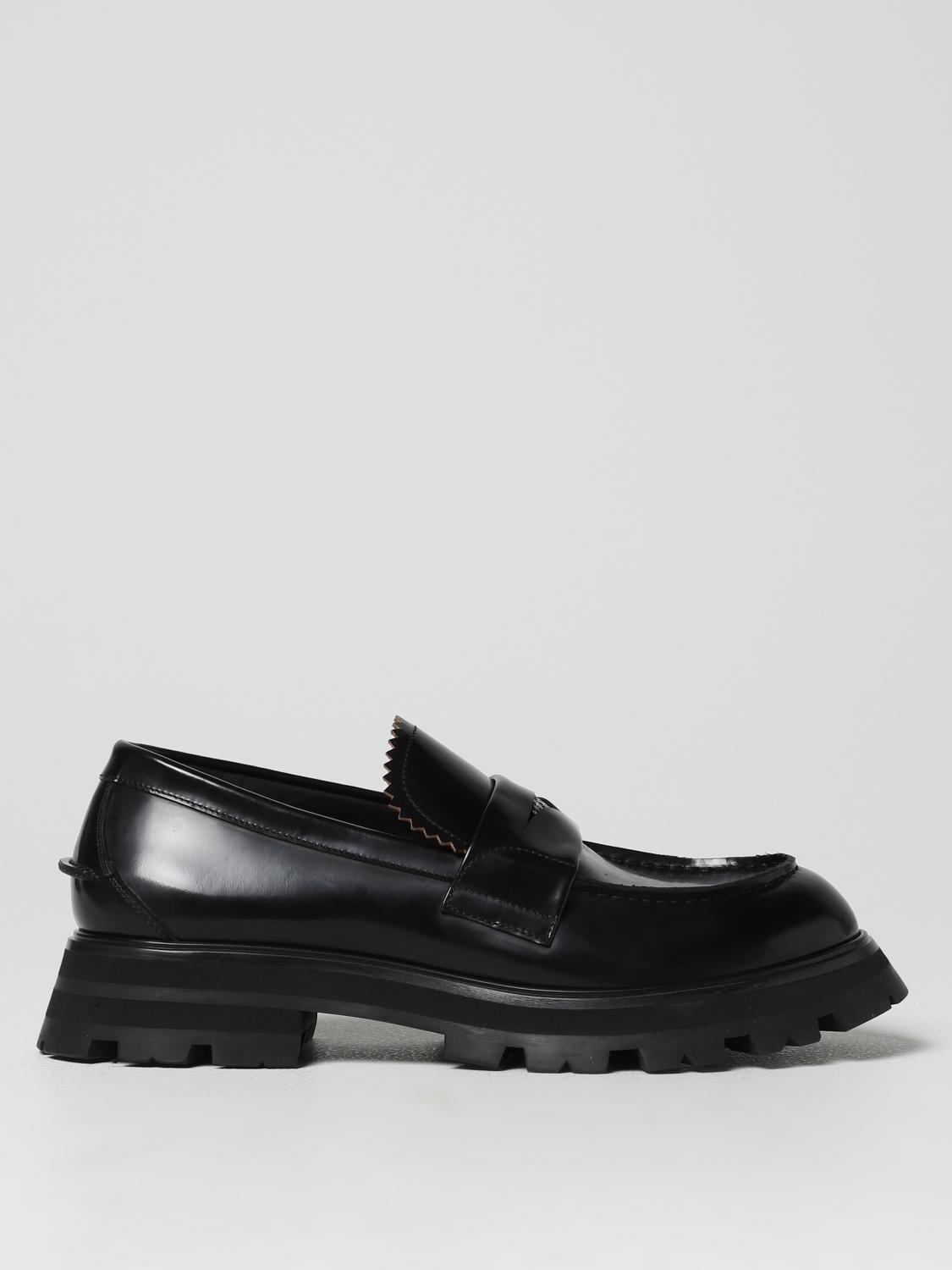 Alexander Mcqueen Seal Logo Leather Penny Loafers In Black