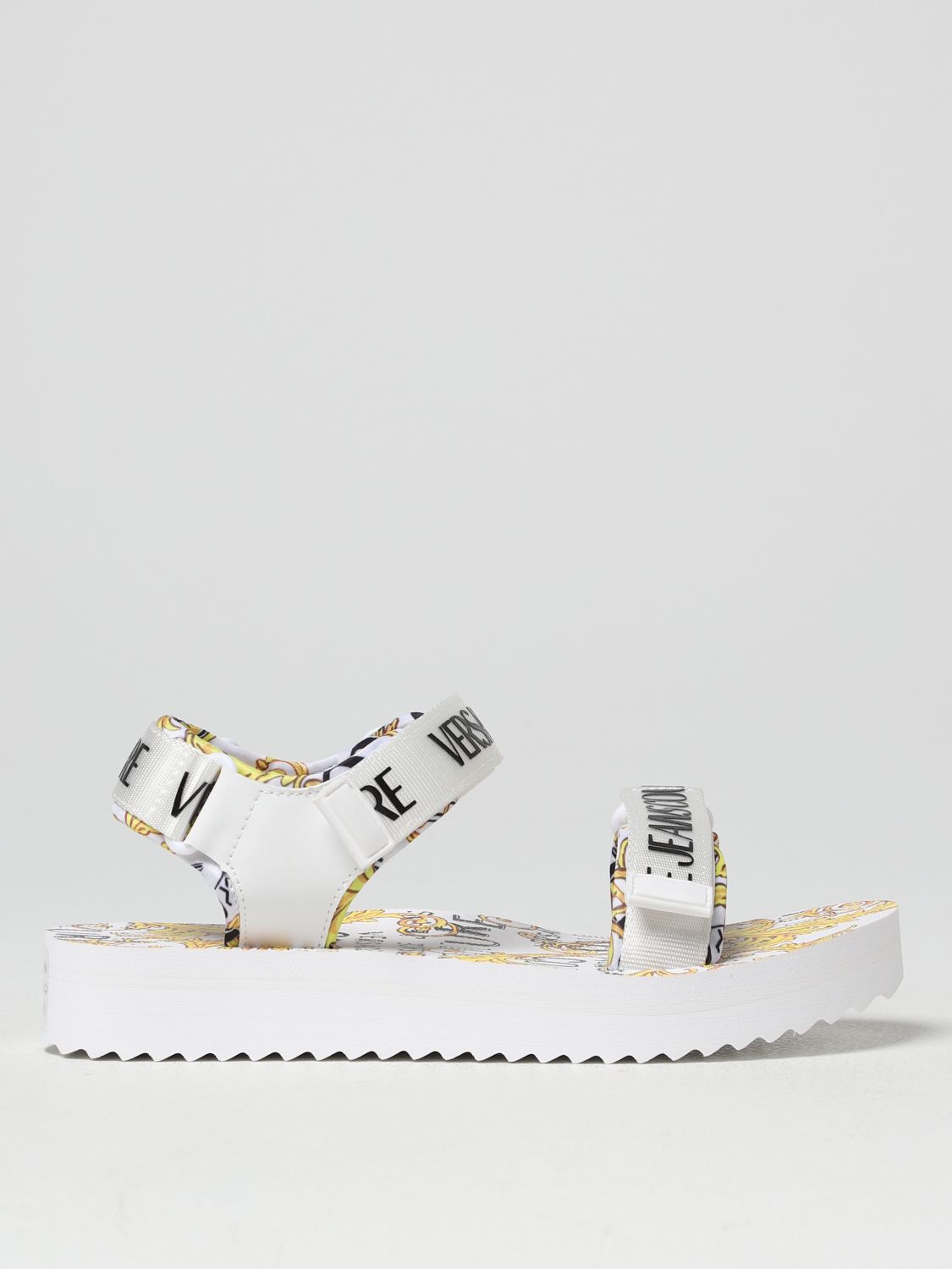 geestelijke Oppervlakte jongen VERSACE JEANS COUTURE: sandals in nylon and rubber - White | Versace Jeans  Couture flat sandals 74VA3SX4ZS196 online on GIGLIO.COM