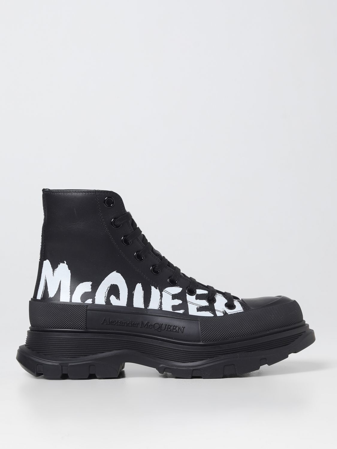 Shop Alexander Mcqueen Tread Slick Leather Boots With Printed Logo In Black
