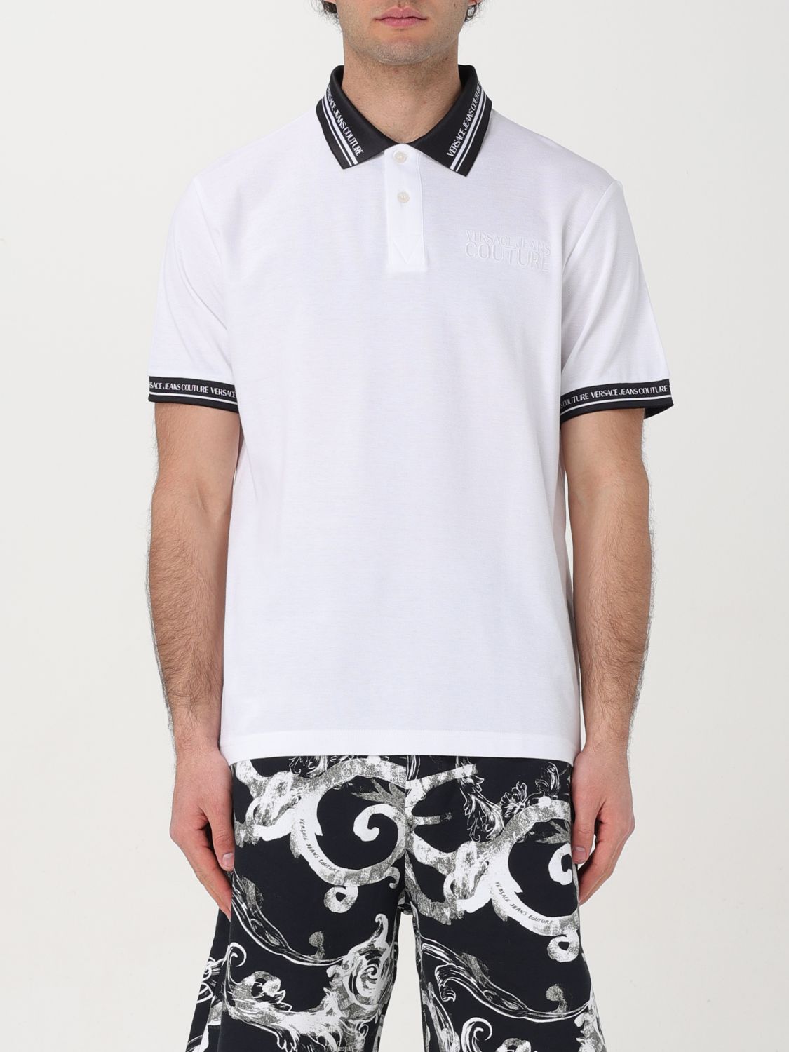Shop Versace Jeans Couture Polo Shirt  Men Color White