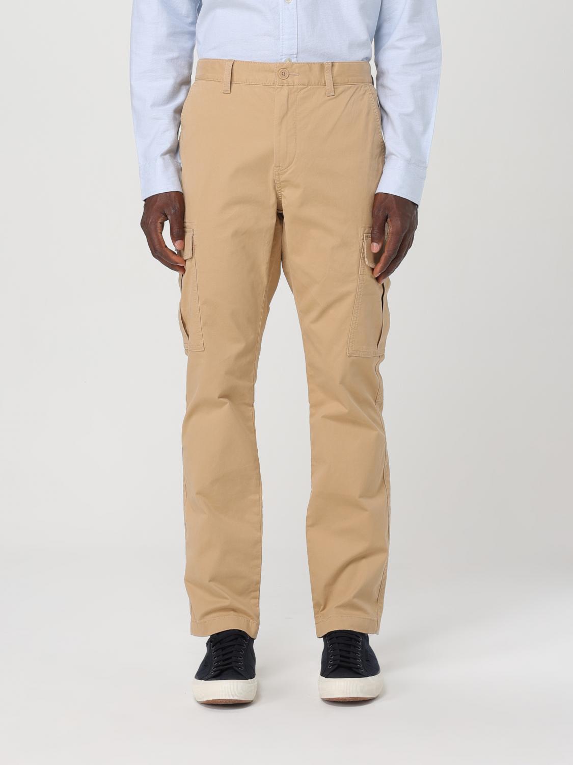 Shop Tommy Jeans Pants  Men Color Beige