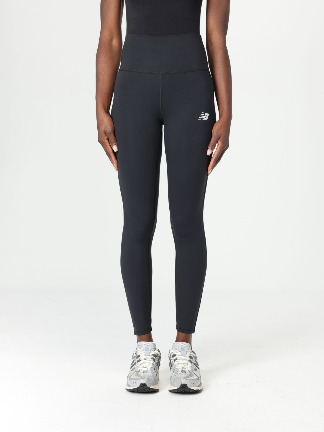 Shop New Balance Pants Woman Color Black
