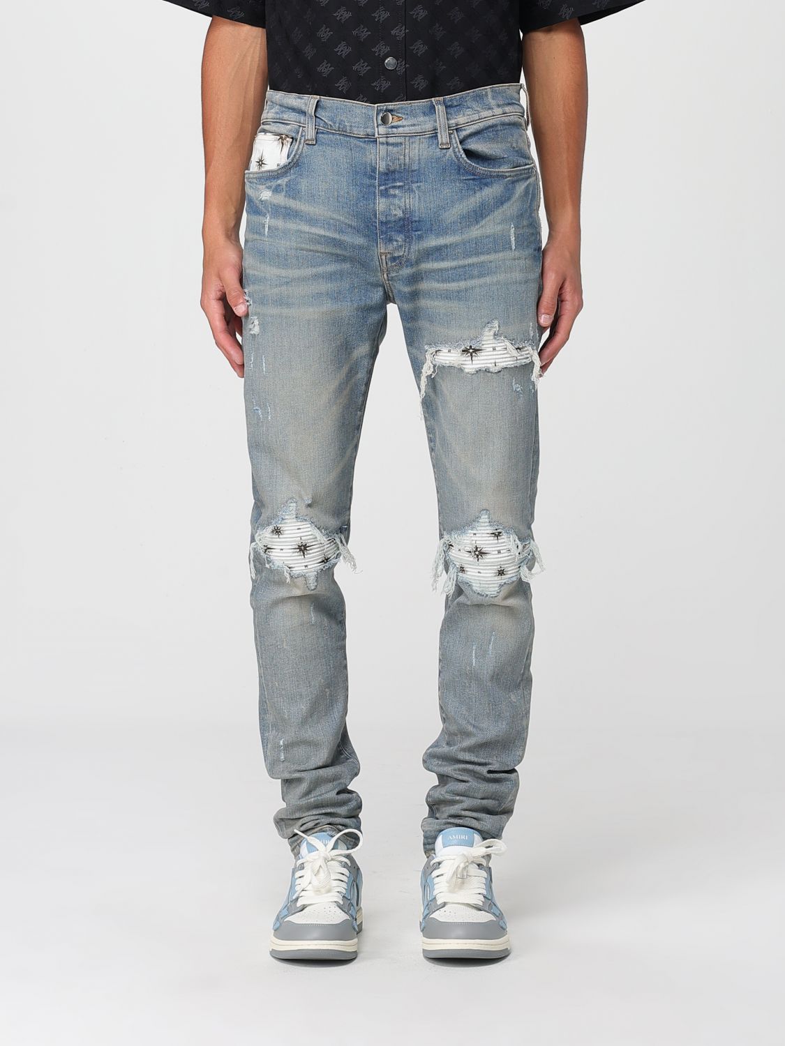 Amiri Light Blue Jeans With Ribbed Details On The Front And Logo Patch On The Rear In Denim Man In Blue