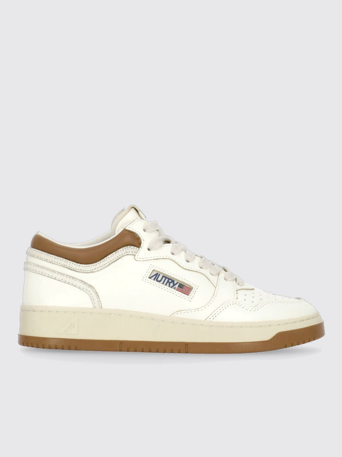 Autry Perforated Platform Leather Sneakers In White