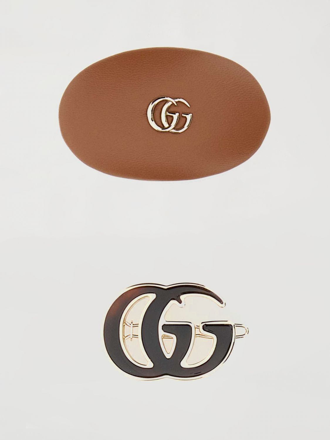 GUCCI Set 2 fermagli in metallo e pelle