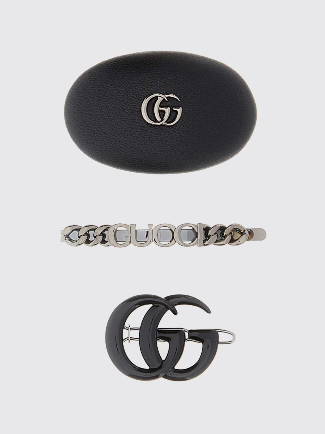 GUCCI Set 3 fermagli in metallo e pelle