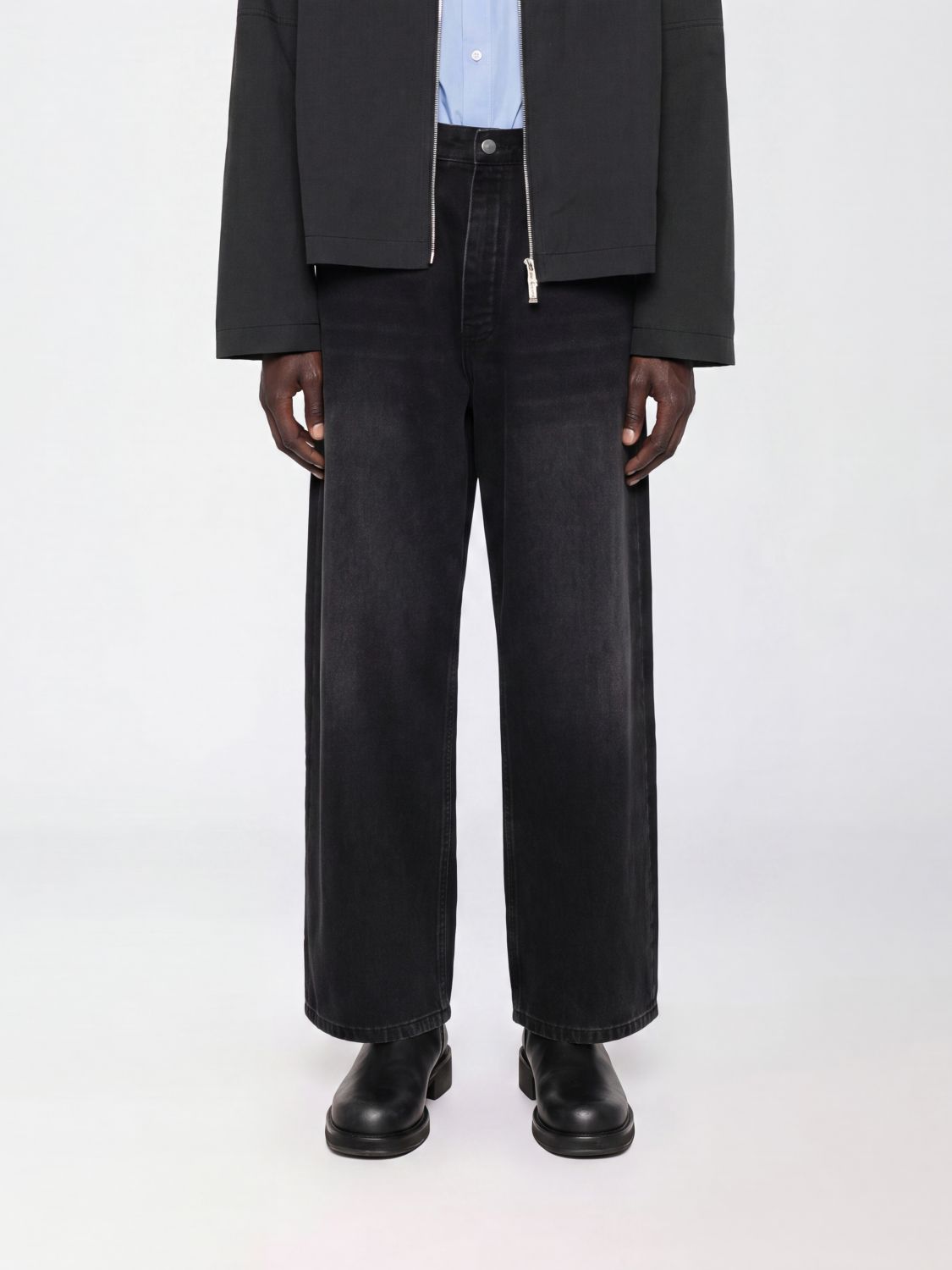 STUDIO NICHOLSON Jeans Men color Black